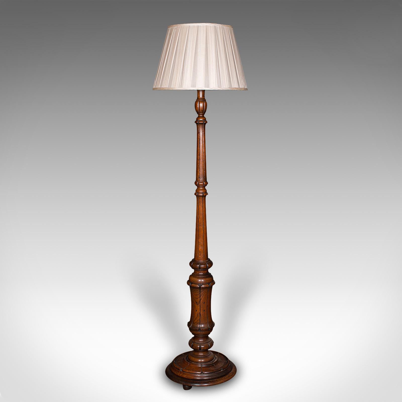 This is an antique standard lamp. A Scottish, oak library or lounge reading light, dating to the late Victorian period, circa 1890.

Delightfully carved lamp base, with timeless appeal
Displays a desirable aged patina and in good order
Select oak