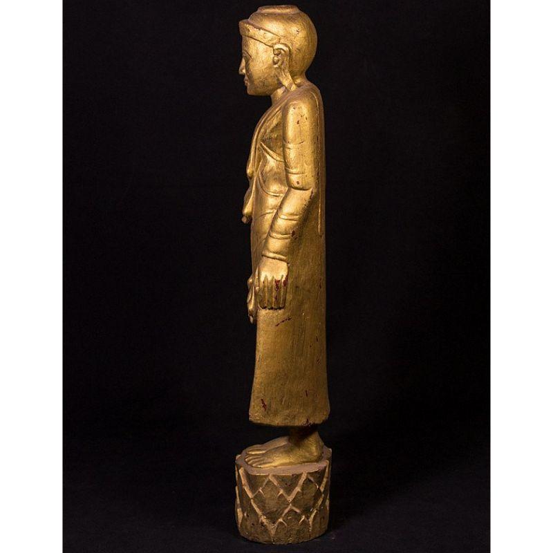 Material: wood.
Measures: 68 cm high 
21 cm wide and 12,5 cm deep.
Weight: 4.9 kgs.
Mandalay style.
Originating from Burma.
Late 19th / early 20th century.

