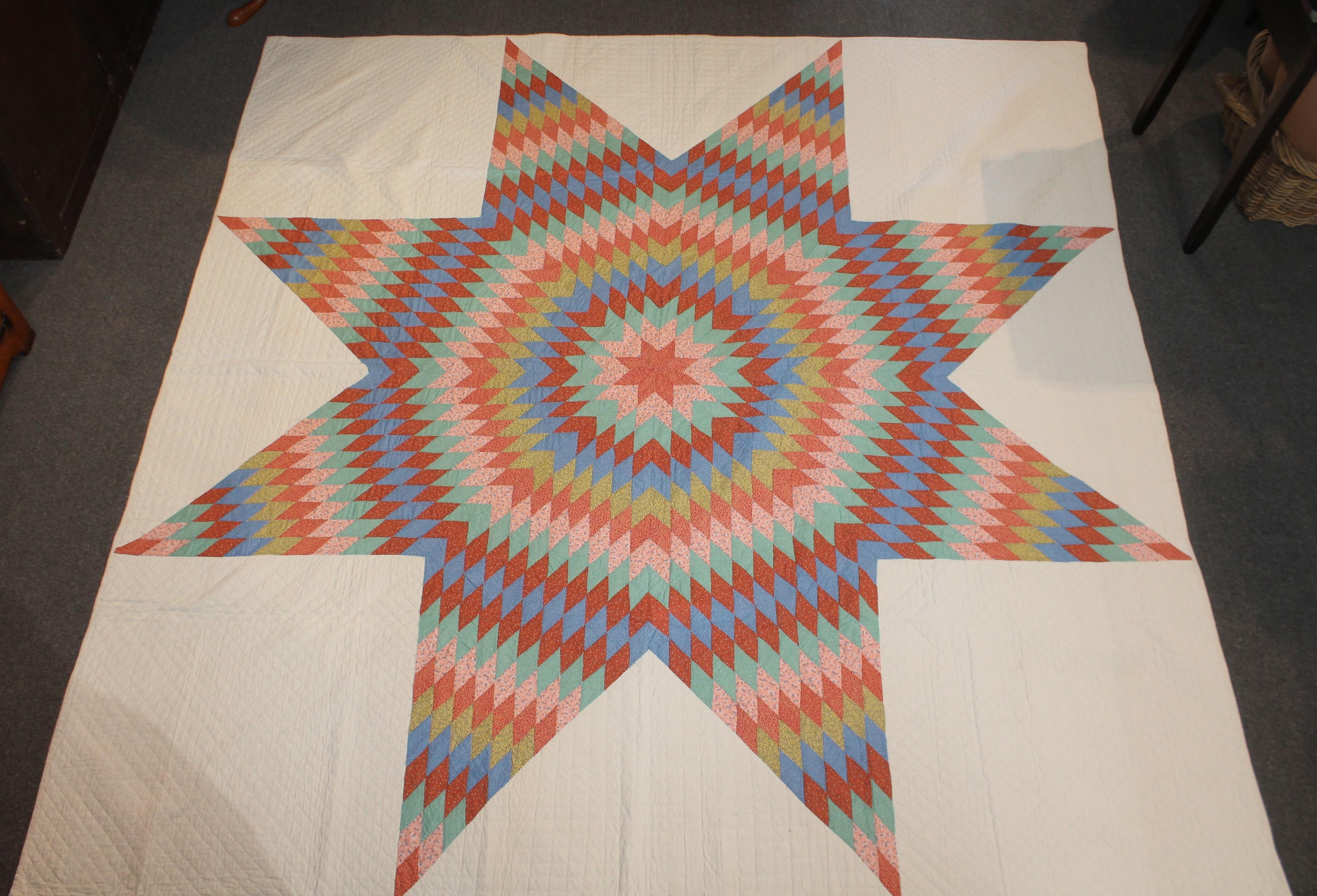 This fantastic early 20th century eight point star quilt is in pristine condition. It was found in Berks County, Pennsylvania and has amazing fall colors.