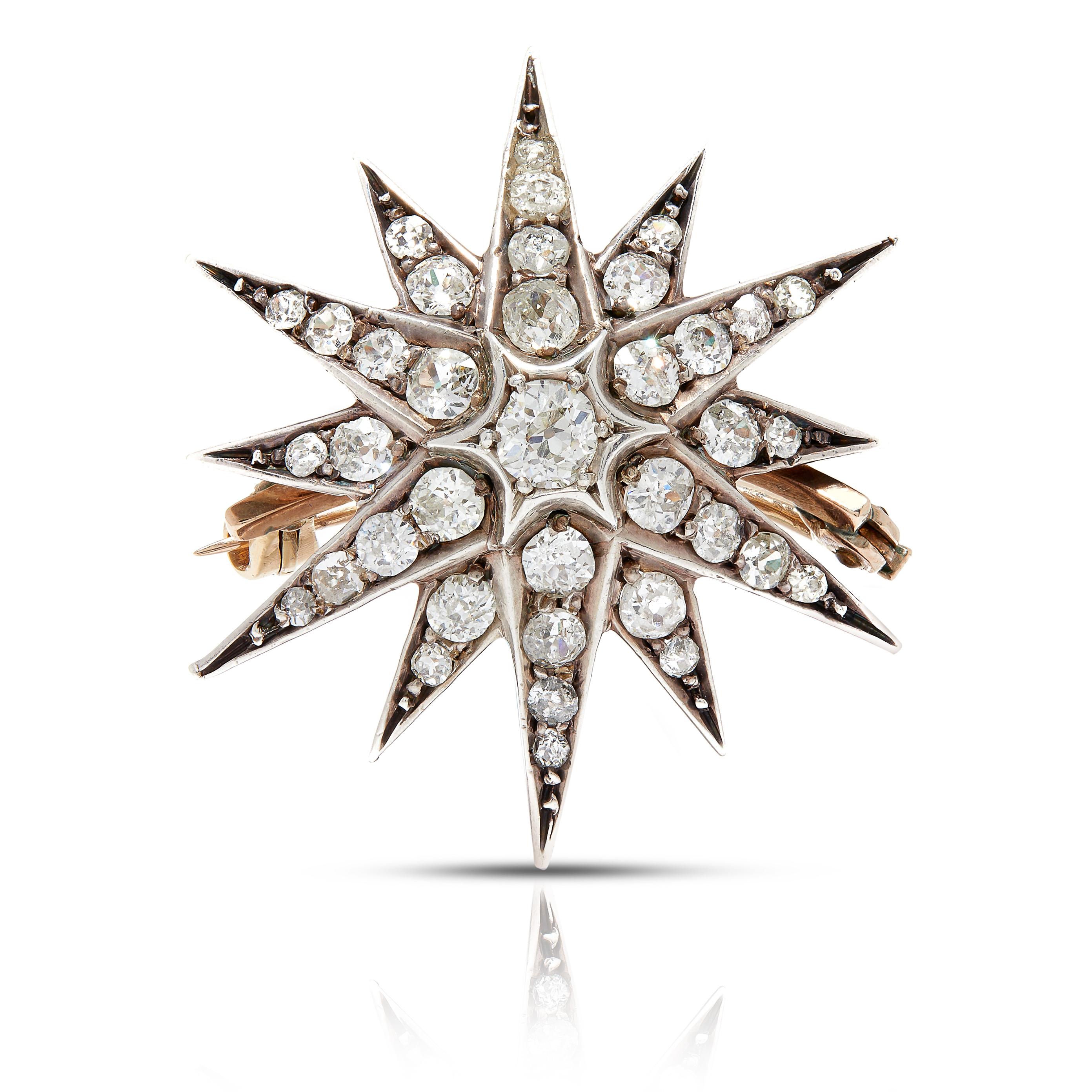 This magnificent late-Victorian diamond brooch in starburst motif will brighten up the sky with an explosive blast of celestial light. The twelve rays are expertly handcrafted in darkened silver over 18ct gold and radiate with just over a carat of