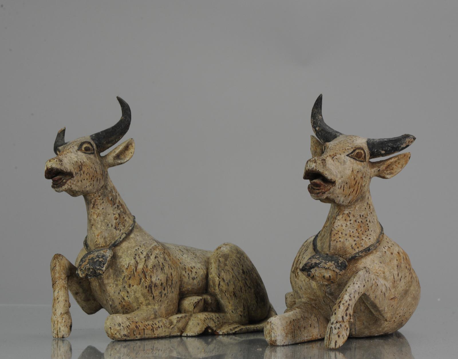 Lovely carved statues.

Condition
Overall condition some damage to horns and ware consistent to age. Size: 220 x 230 x 120mm Height x length x depth approx
Period
20th century.
 