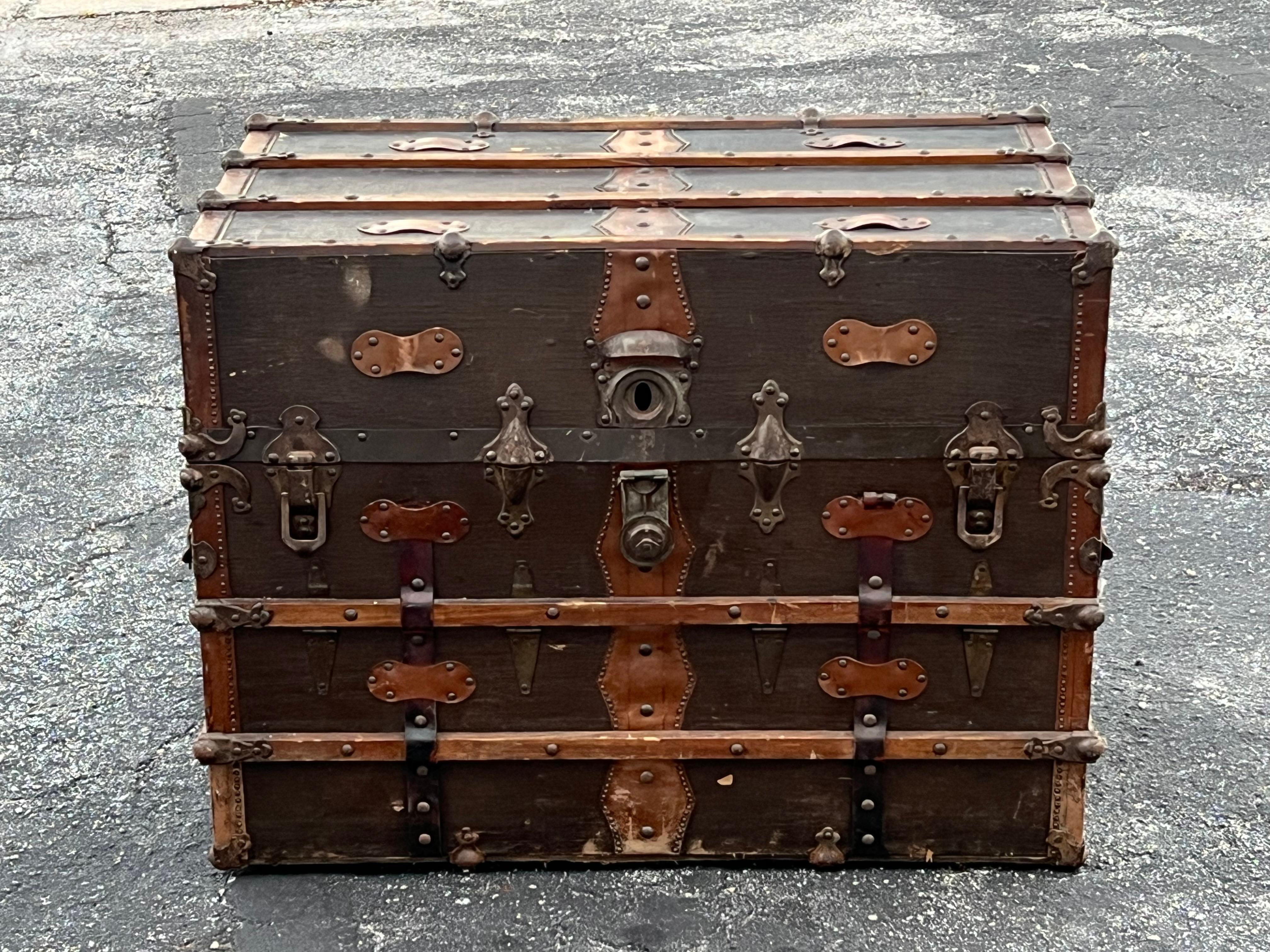 A lovely steamer trunk with nice detailing and heavy duty, quality construction. Ca' 1890's. This trunk is large! Measuring 34.5