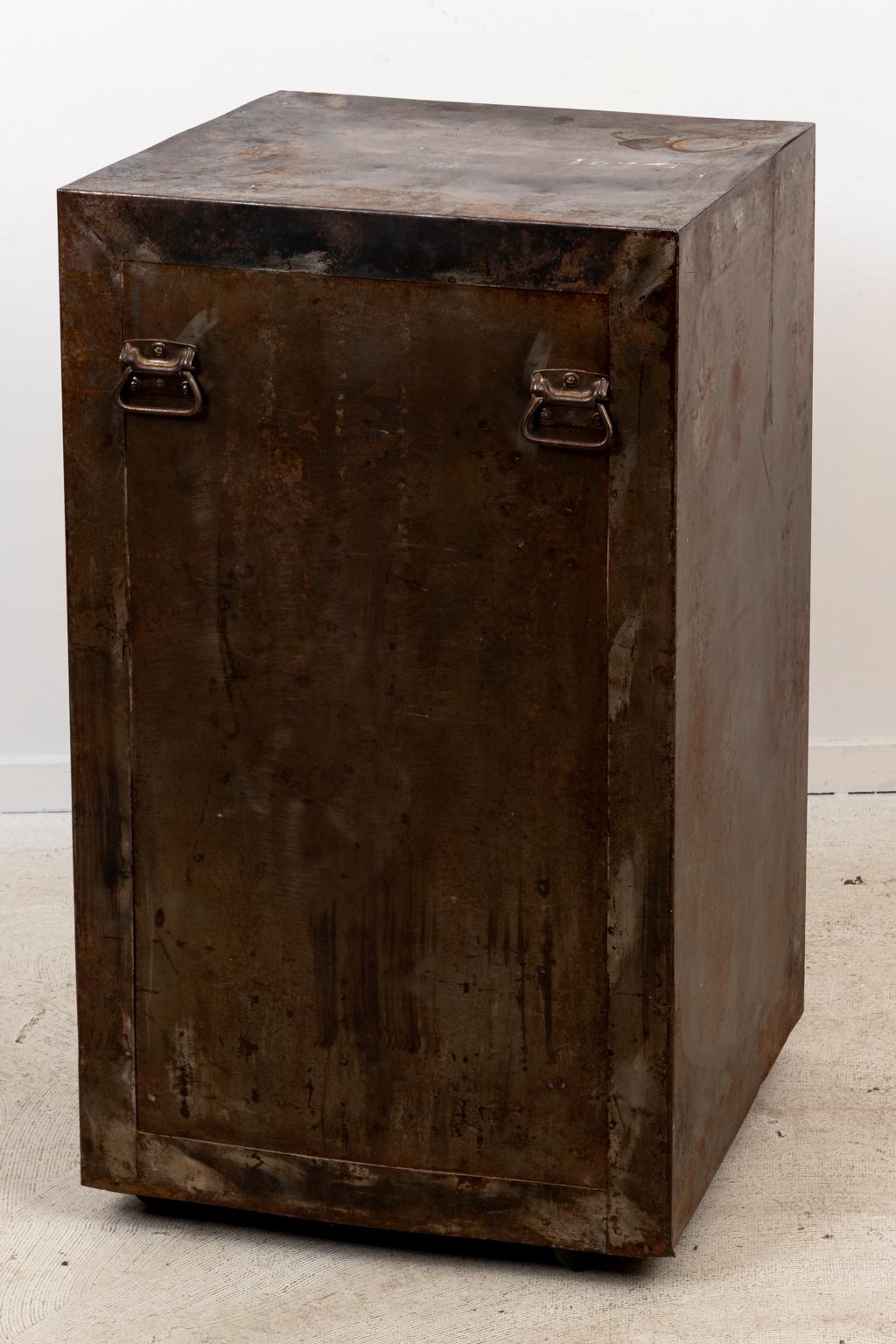 Circa 1900s antique steel file cabinet with twelve drawers. Please note of wear consistent with age including minor patina and oxidation.