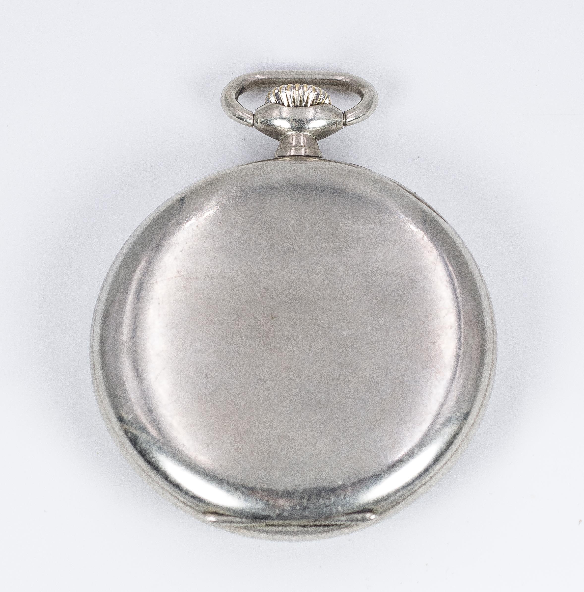 An antique steel Zenith pocket watch, dating from the early 20th Century. 

BRAND
Zenith

MATERIALS
Steel

MEASUREMENTS
Diameter: 49 mm