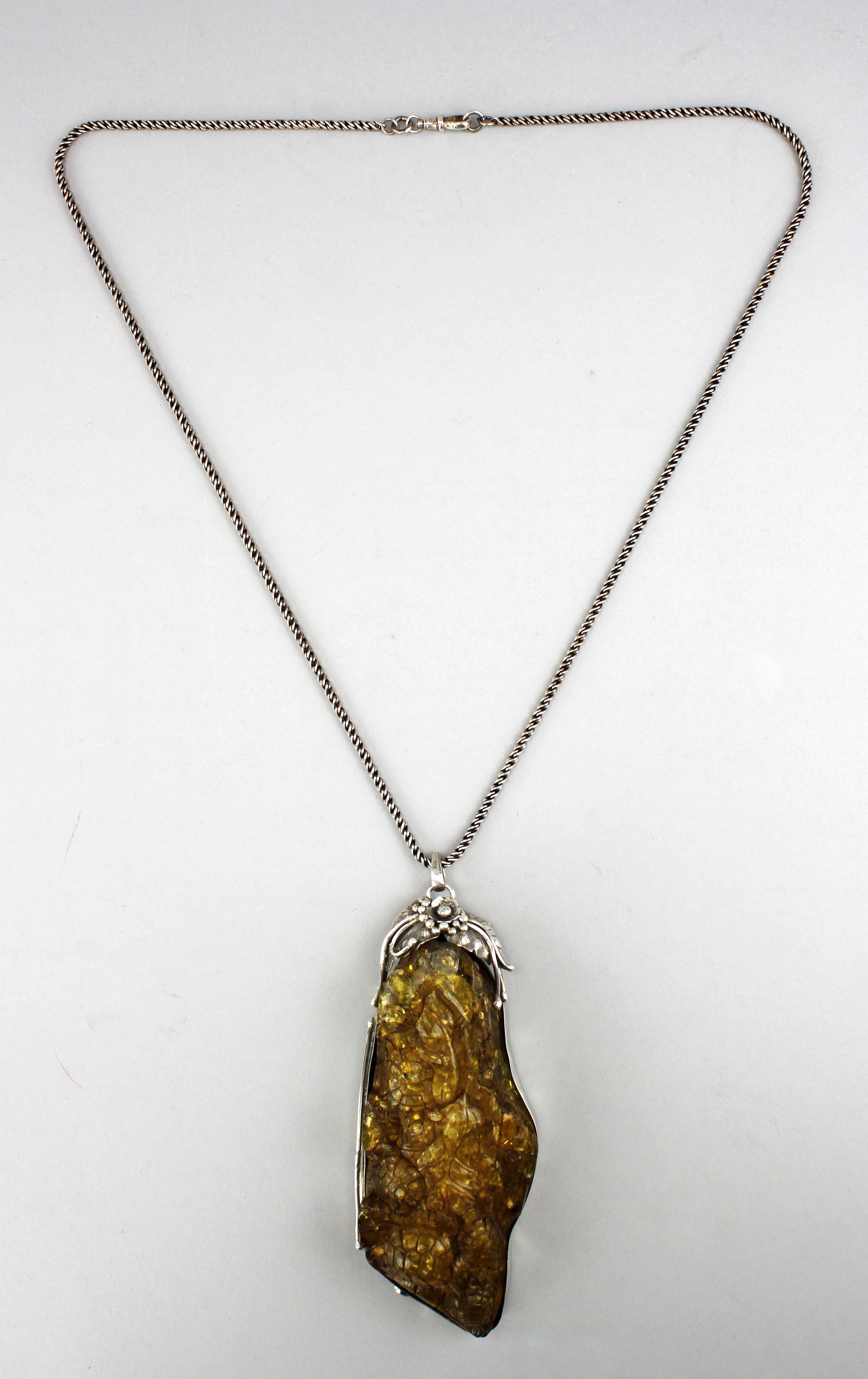 silver amber pendant