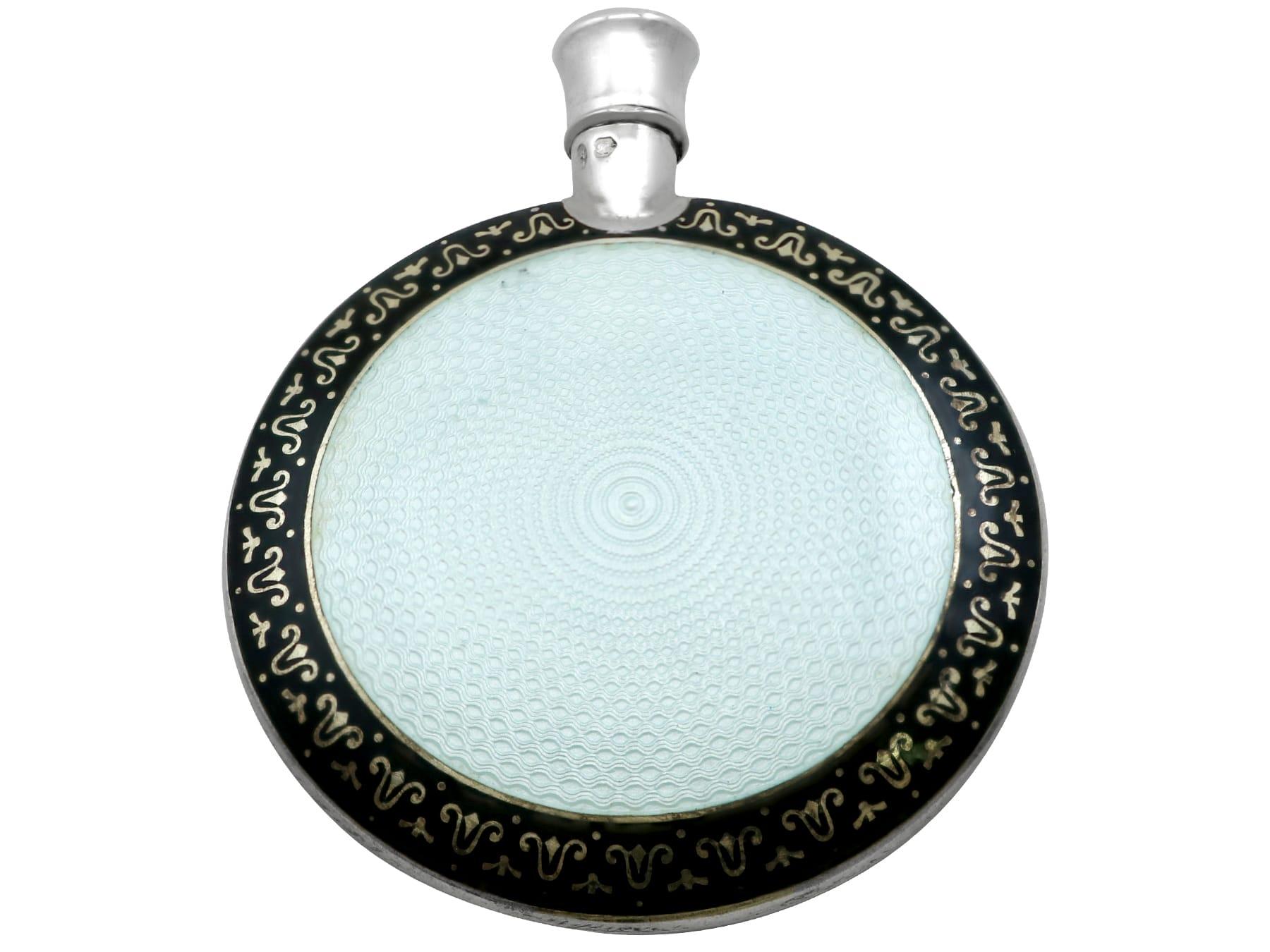 An exceptional, fine and impressive antique French import sterling silver and enamel combination scent bottle and compact with mirror; an addition to our ornamental silverware collection

This exceptional antique enamel and sterling silver gilt