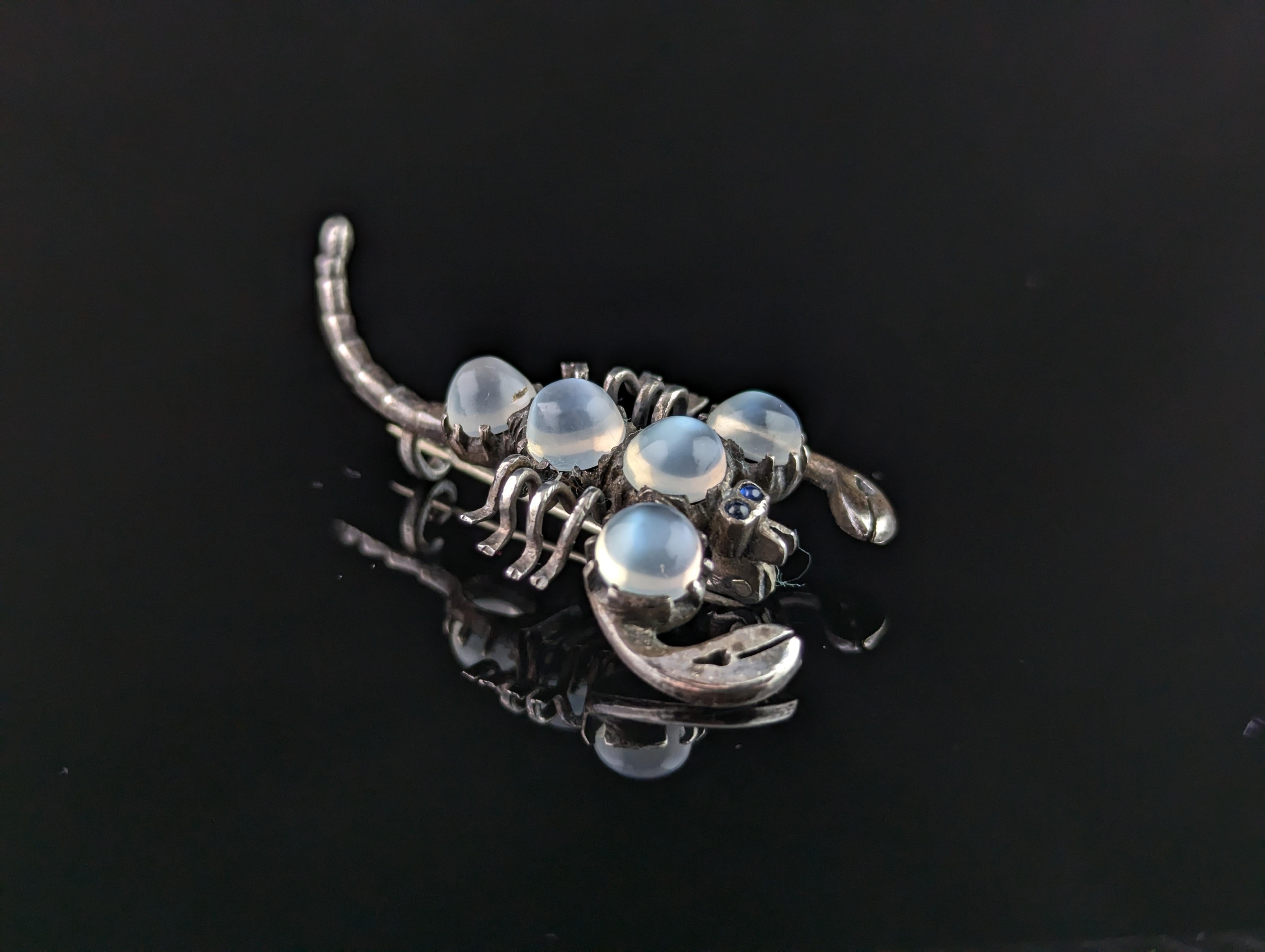 Women's or Men's Antique Sterling silver and Moonstone scorpion brooch, blue paste eyes