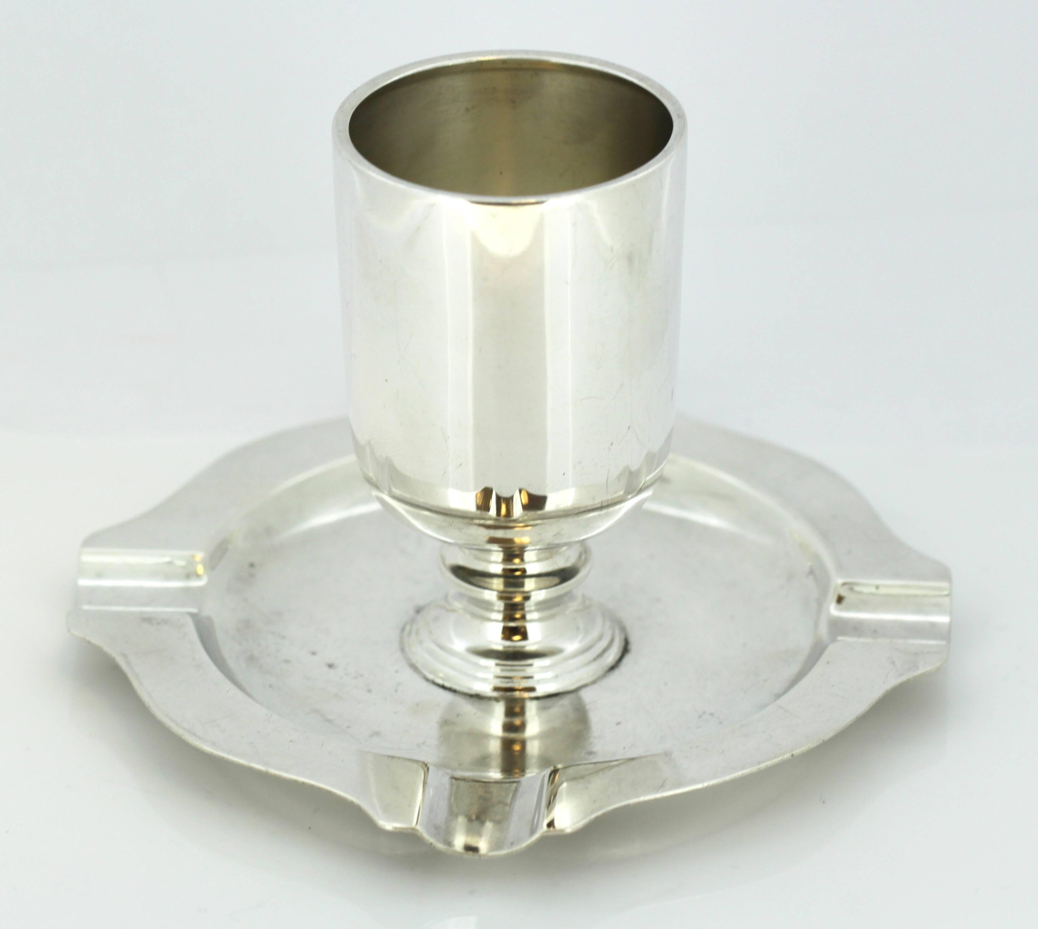 Antique sterling silver ashtray 
Maker: William Neale & Son Ltd 
Made in Birmingham 1934 

Dimensions: 
Diameter x Height 13 x 9 cm 
Weight: 165 grams.

Condition: Surface wear and tear from general, has a couple of minor age related