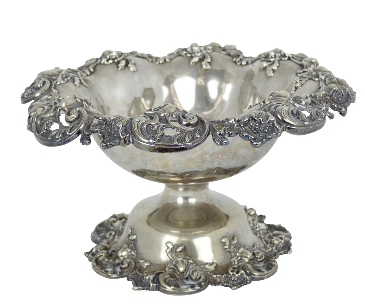 This sterling silver bowl is nicely decorated and the perfect size for serving food/snacks. The decoration include flowers and grapes among the rim and the base. The bowl has a non conspicuous monogram 