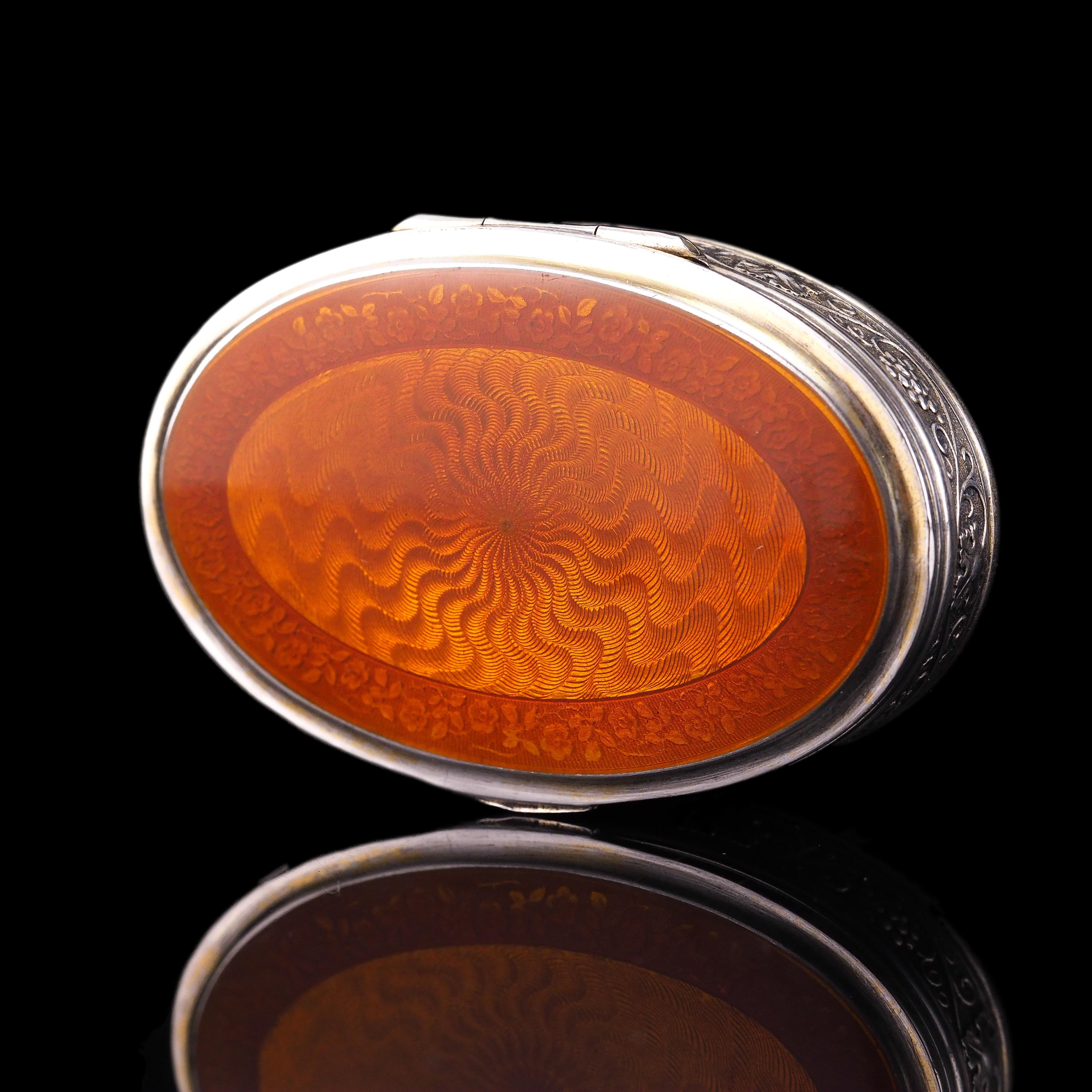 We are delighted to offer this solid silver orange guilloche enamel box made by the famous Norwegian maker, David Anderson with marks c.1888-1925.

(Price negotiations may be possible under certain criteria, please contact us or search for Artisan