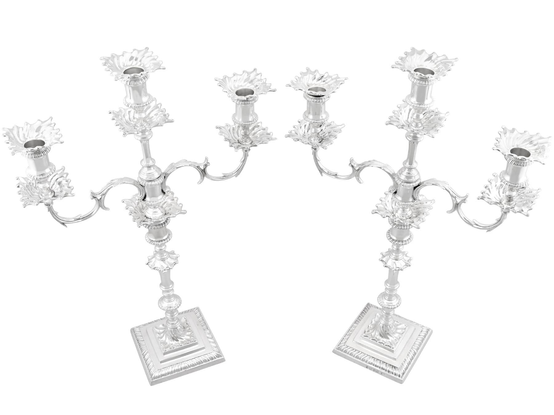 An exceptional, fine and impressive pair of versatile antique English sterling silver three-light candelabra; an addition to our diverse candle holders collection.

These exceptional antique cast sterling silver candelabra have a classical square