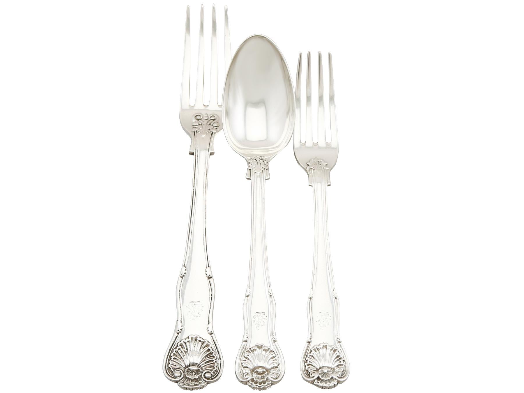 An exceptional, fine and impressive antique English sterling silver King's Husk pattern flatware service for 12 persons; an addition to our canteen of cutlery collection.

The pieces of this fine, antique sterling silver flatware set for 12