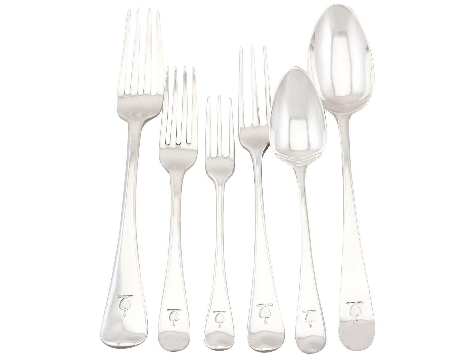 An exceptional, fine and impressive, composite antique English sterling silver Old English pattern flatware service; an addition to our antique London silverware collection.

The pieces of this exceptional antique sterling silver flatware set have