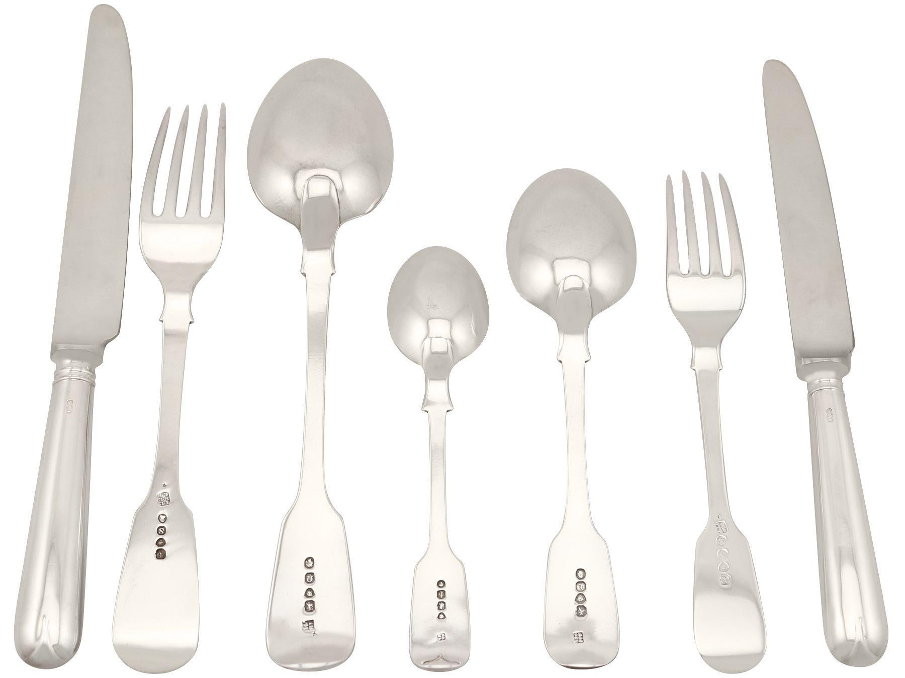 The pieces of this exceptional composite antique sterling silver flatware set for twelve persons have been crafted in the fiddle pattern.

The reverse surface of each spoon features a rounded heel to the bowl and pip to the handle terminal; the