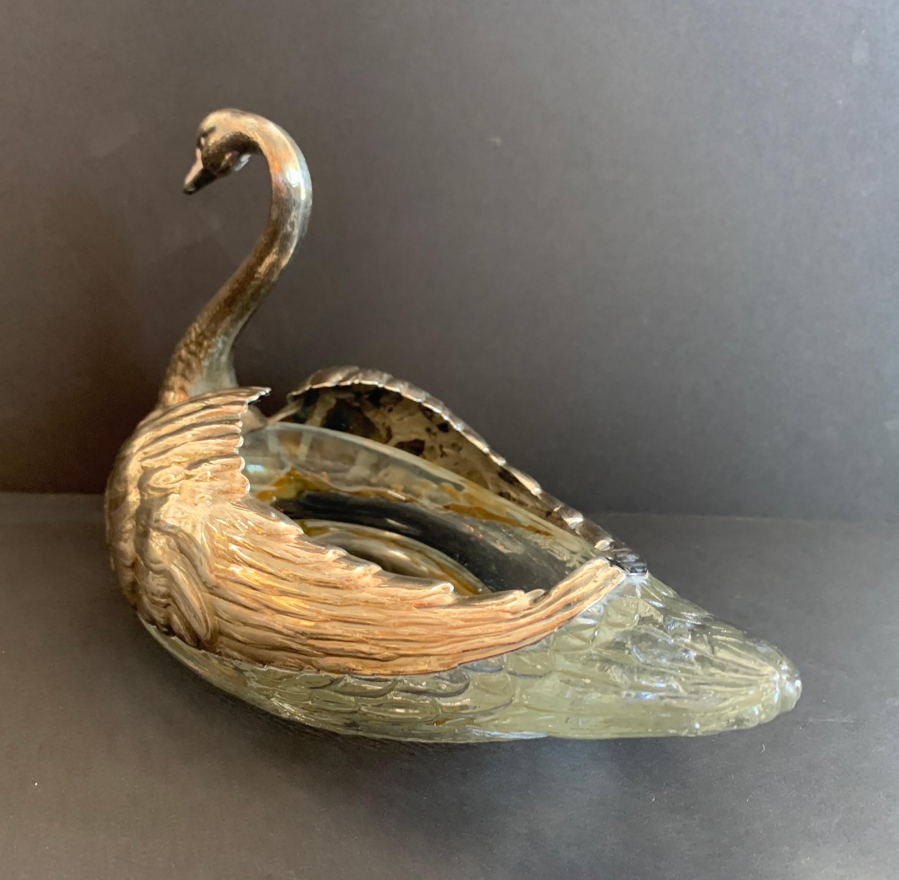 An antique sterling silver carved rock crystal large stately swan serving piece in the manner of Gorham
Stamped sterling.