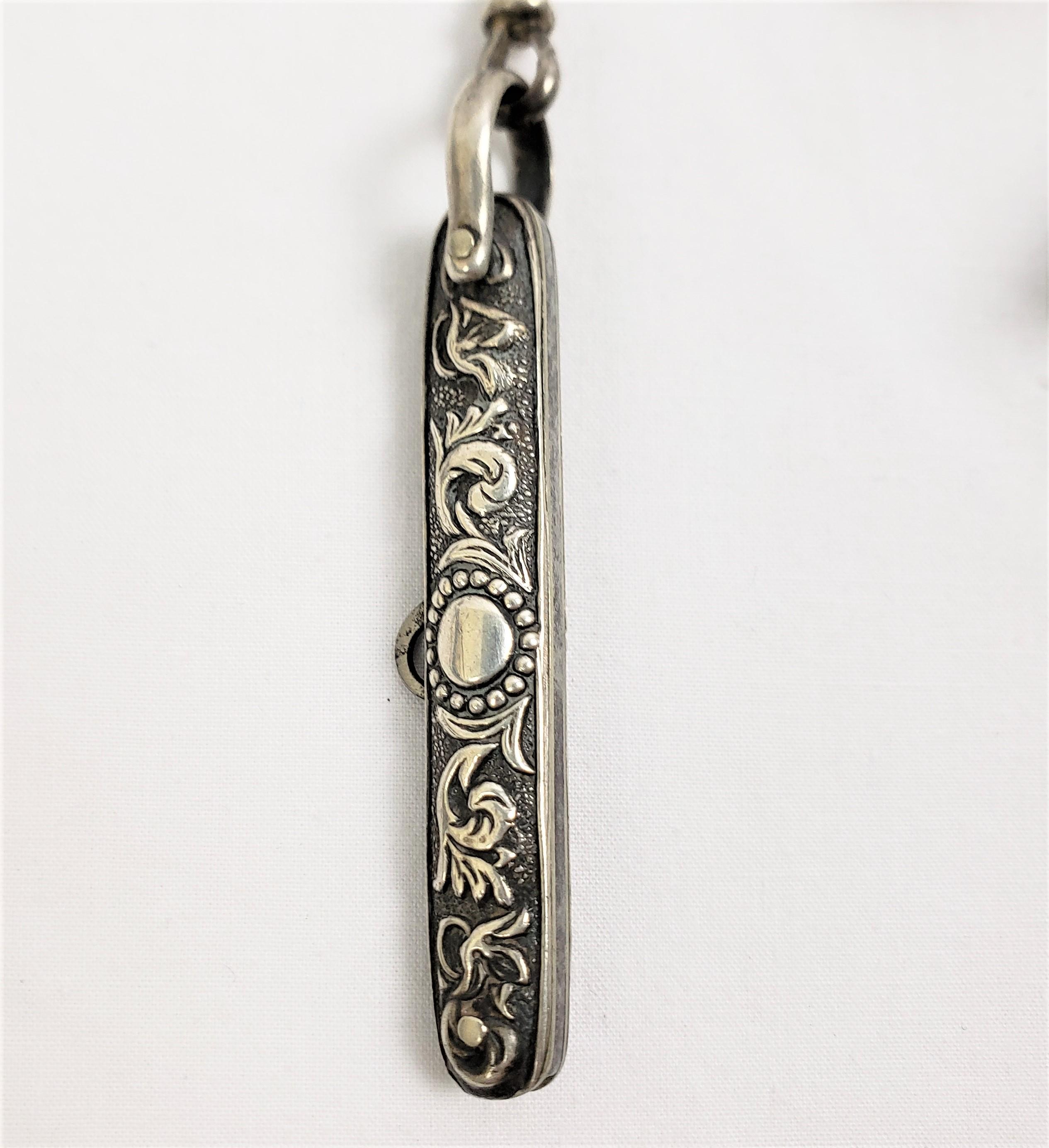 Late Victorian Antique Sterling Silver Chatelaine with Stylized Face & Exotic Bird Decoration