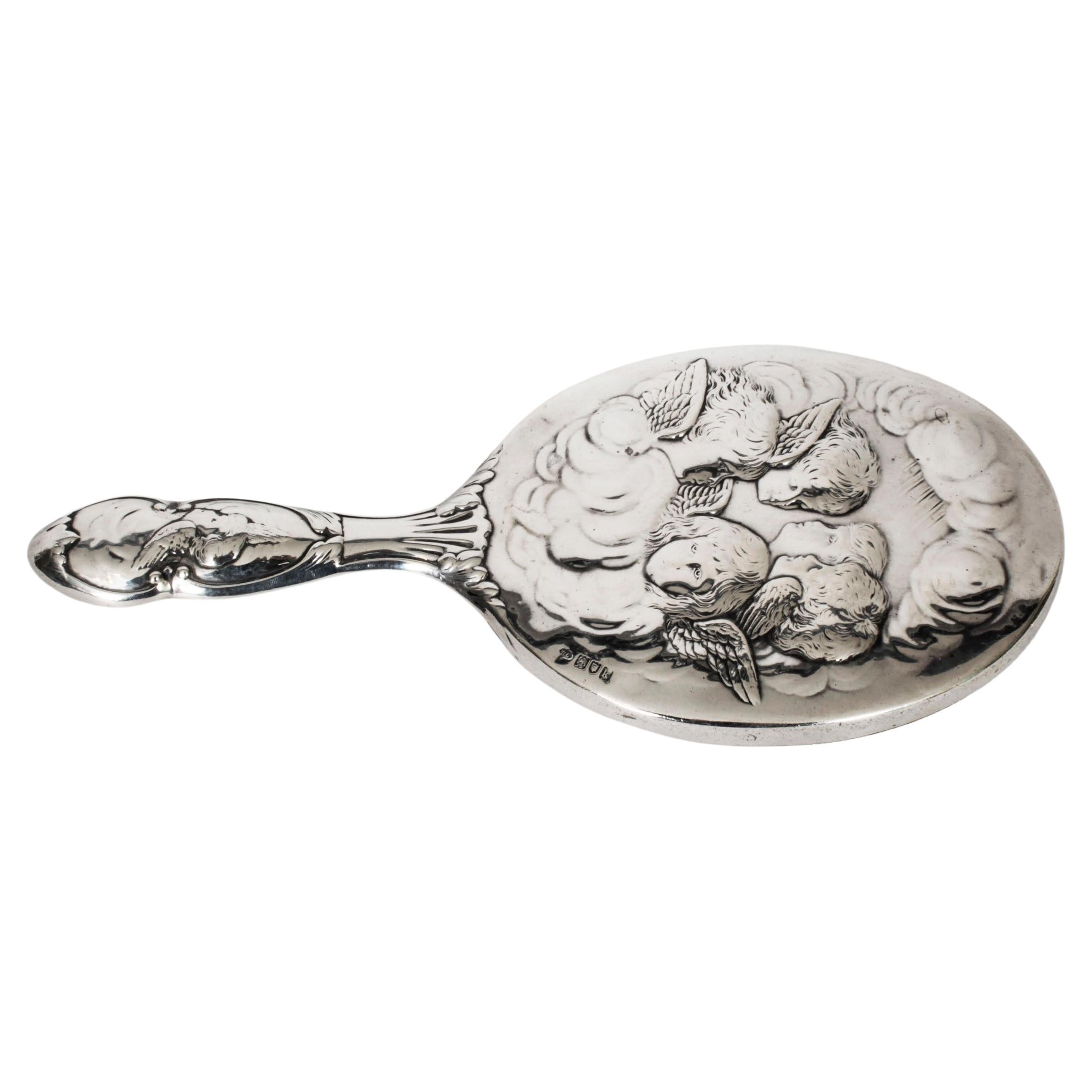 Antique Sterling Silver Cherubs Hand Mirror 1905 William Comyns & Sons. For Sale