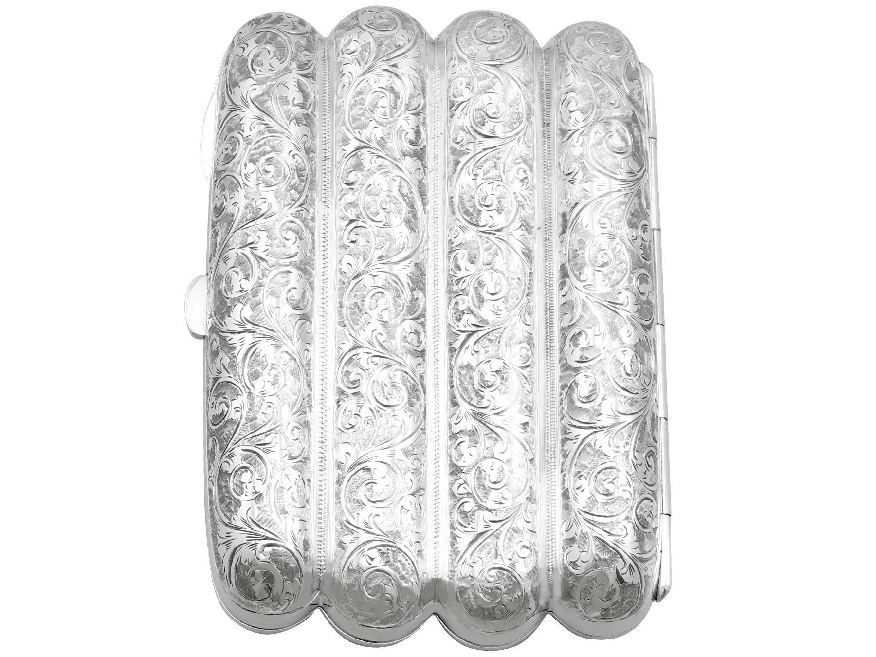 An exceptional, fine and impressive antique Victorian English sterling silver four finger cigar / cheroot case; an addition to the ornamental silverware collection

This exceptional antique sterling silver cigar case has a rounded rectangular shaped