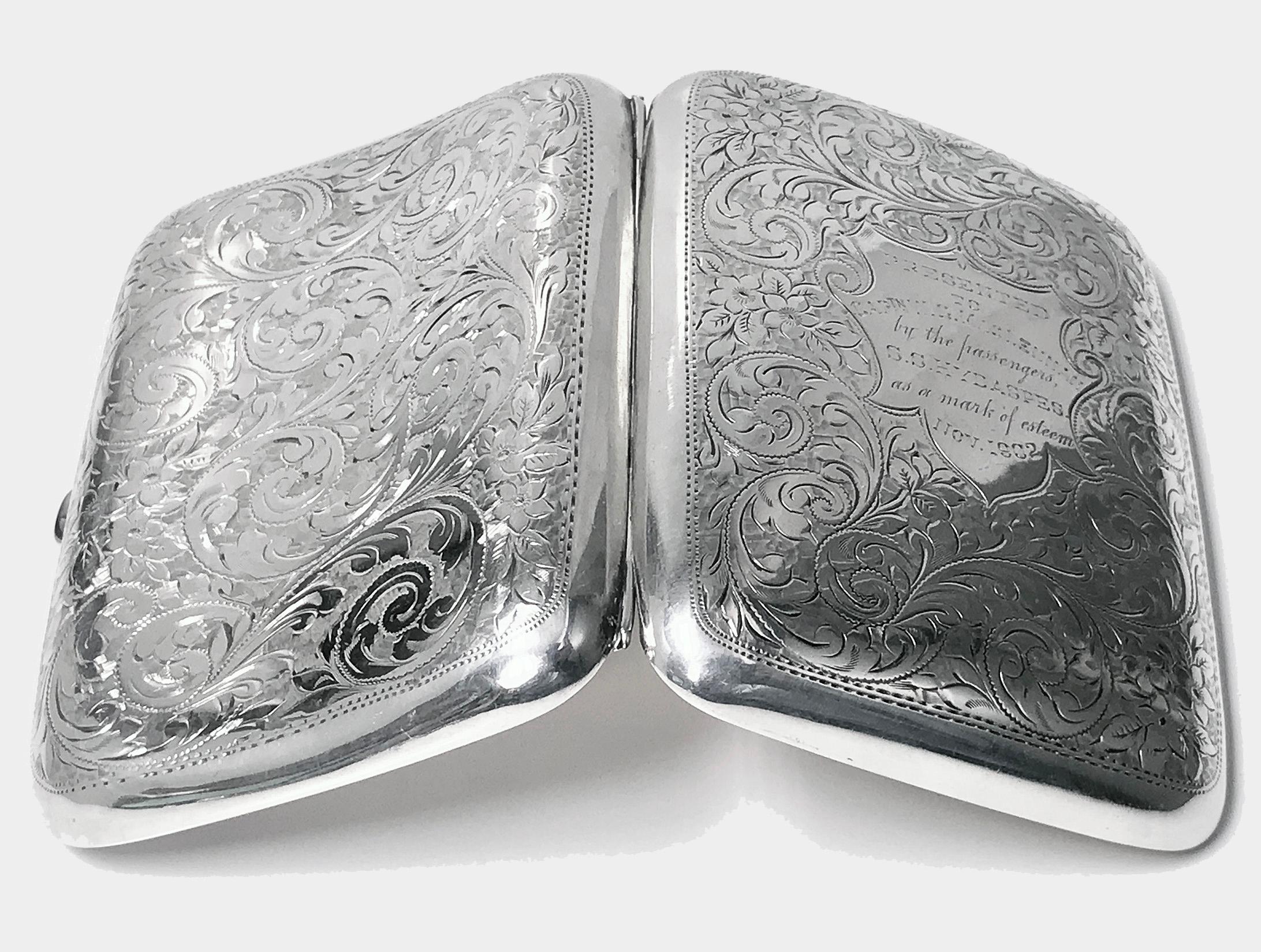 Antique sterling silver cigarette cigarillo case, Birmingham, 1901, Samuel Levi. The case of rectangular concave shape engraved foliate pinprick style decoration, central cartouche, engraved 'PRESENTED TO CAPtn W.G.MacLENNAN by the passengers