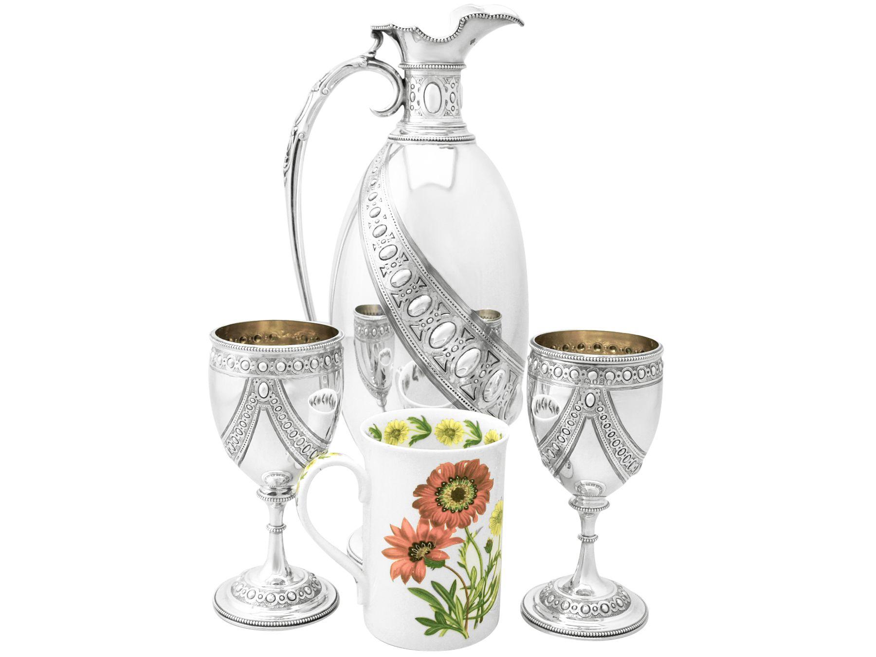 An exceptional, fine and impressive antique Victorian English sterling silver claret jug with matching goblets made by Barnard & Sons Ltd, an addition to our range of collectable silverware

This exceptional Victorian sterling silver set consists