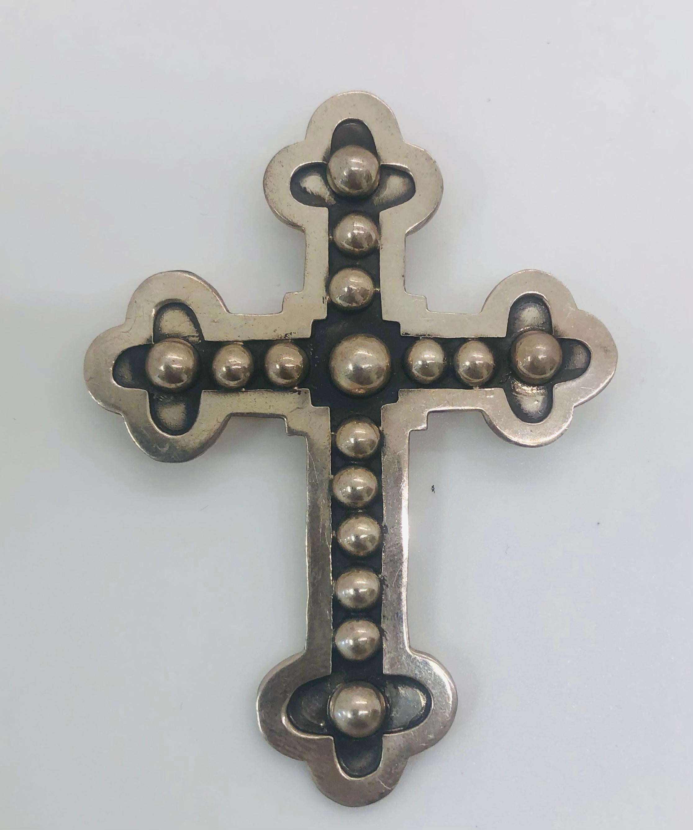 A set of 6 hand crafted antique cross pendant. Each pendant is different in style and shows Native American design in the style of pendant is made of sterling silver. The pieces are attributed to T-Foree but not signed by the designer. 

6 piece