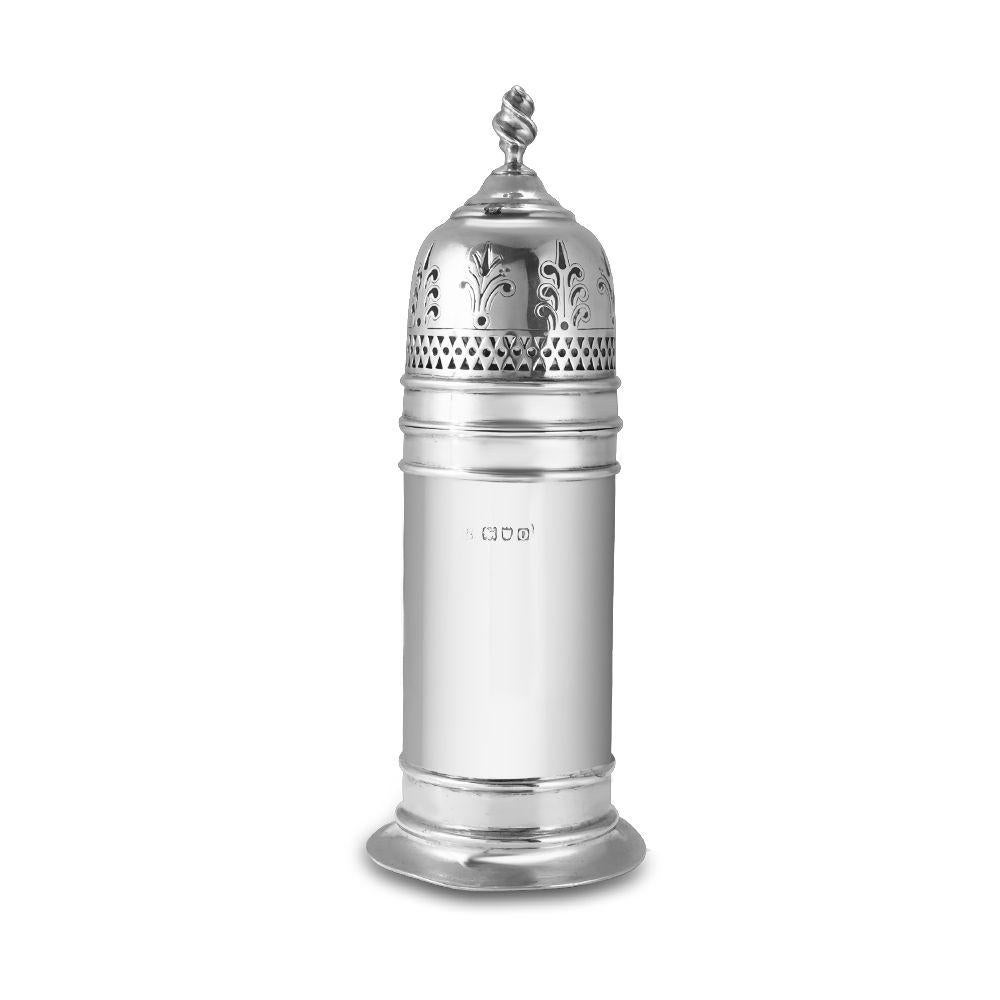Fine and impressive, large Antique Edwardian sterling silver sugar caster. Domed Cover with ornamental piercing and Spiral finial. Approx. 7.25” High. Weighing approx. 160.75g. Hallmark corresponds to London, England, circa 1909. A great gift for