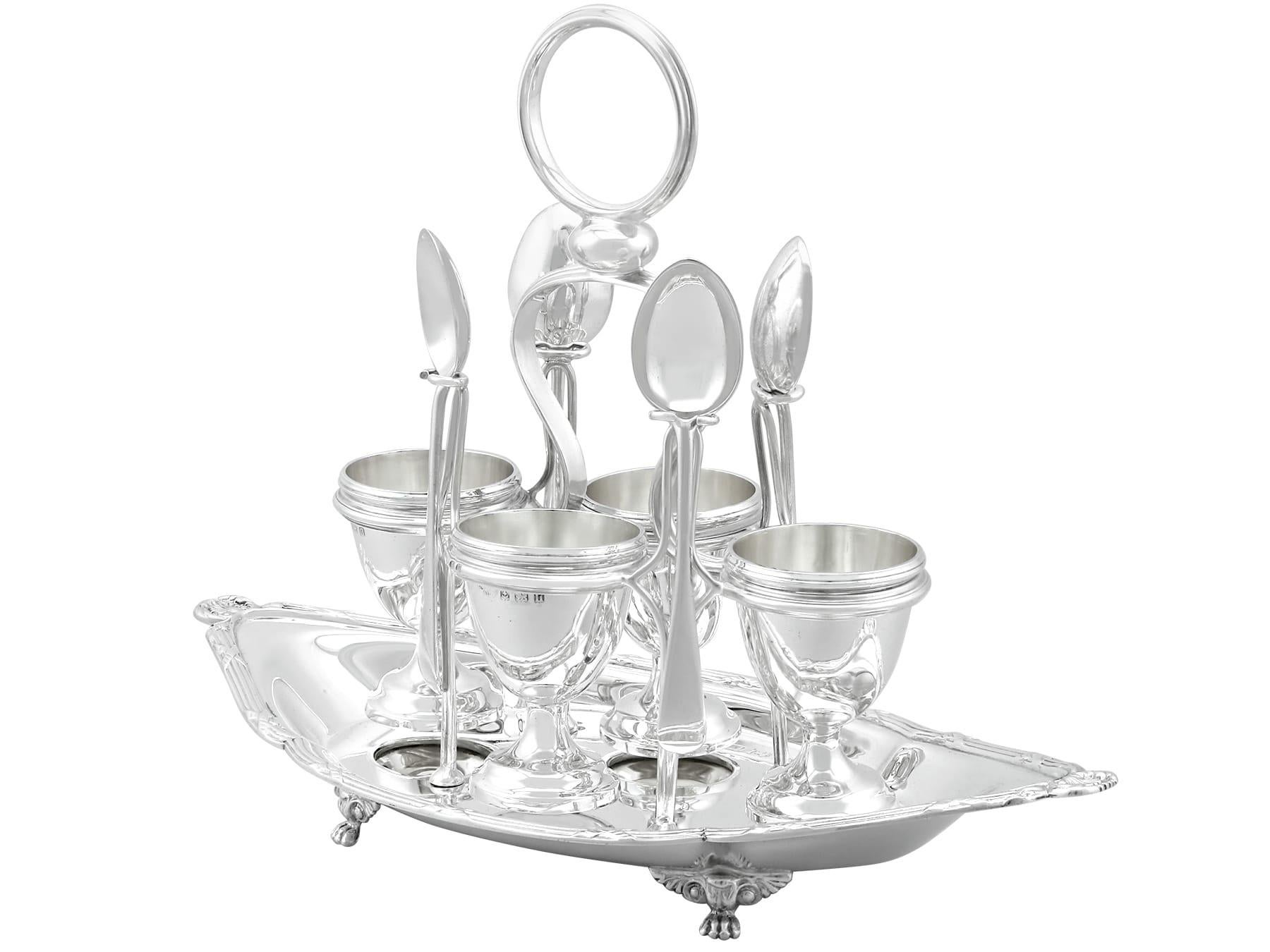 An exceptional, fine and impressive, antique George V English sterling silver egg cruet set with spoons for four persons; part of our dining silverware collection

This exceptional antique sterling silver egg cruet set consists of four egg cups