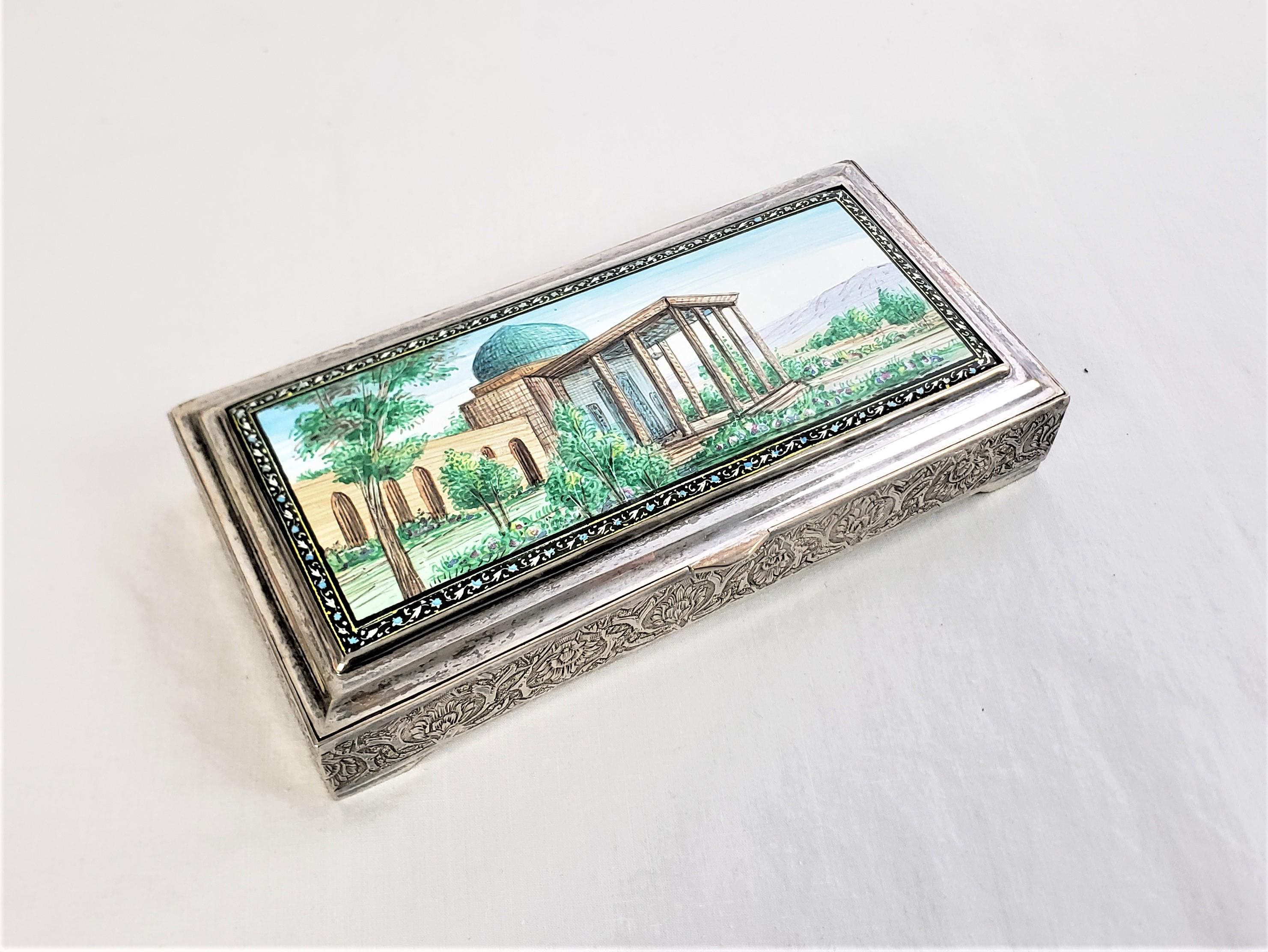 This antique box is signed by an unknown maker, but presumed to have originated from the UAE and date to approximately 1920 and done in the period Bessarabian style. The box is composed of sterling silver and has a hand-painted enamel top with an