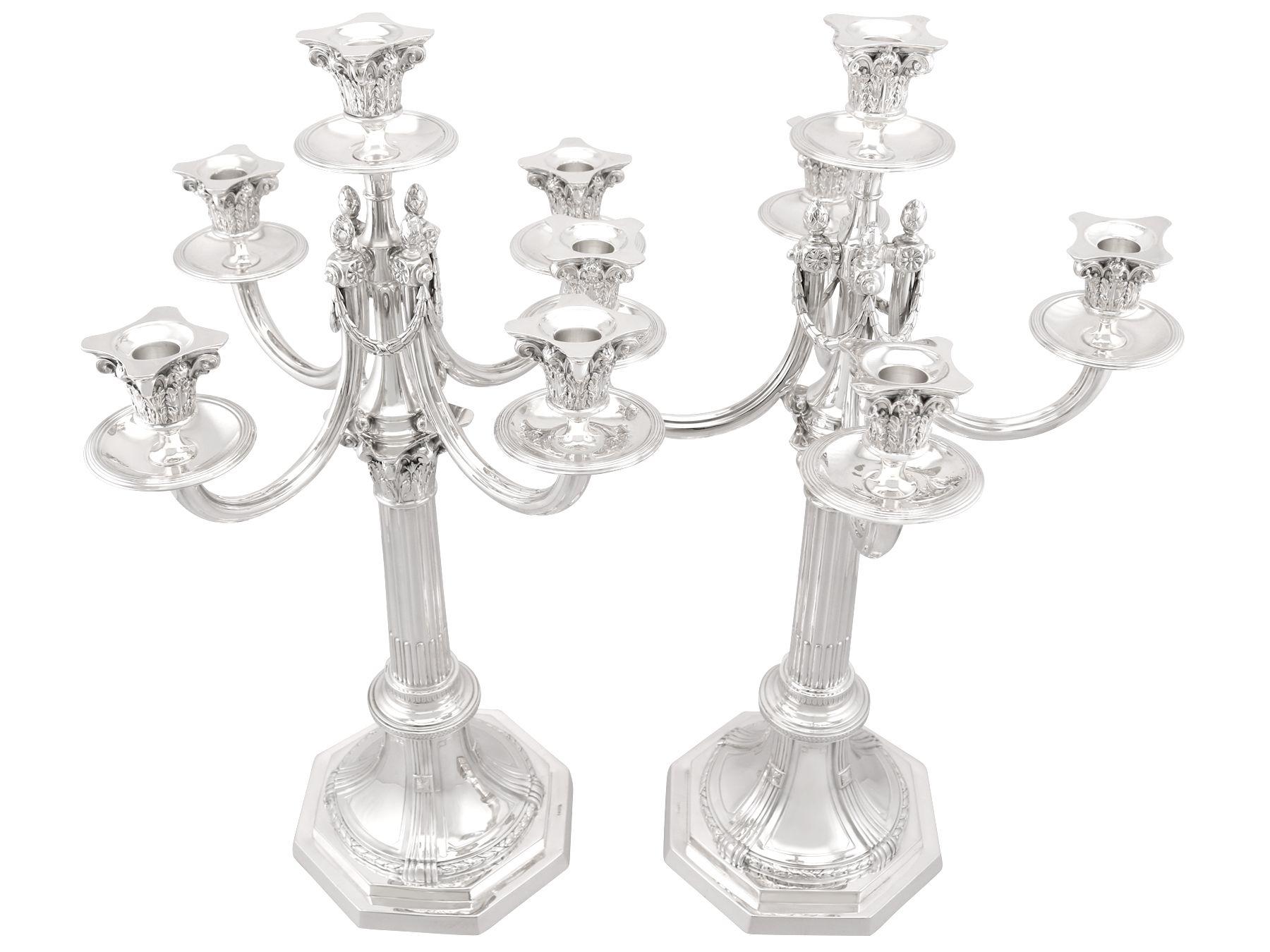 An exceptional, fine and impressive, large pair of antique German silver five light candelabra made in the Empire style; an addition to our ornamental silverware collection

These exceptional and large antique German silver candelabra have a plain