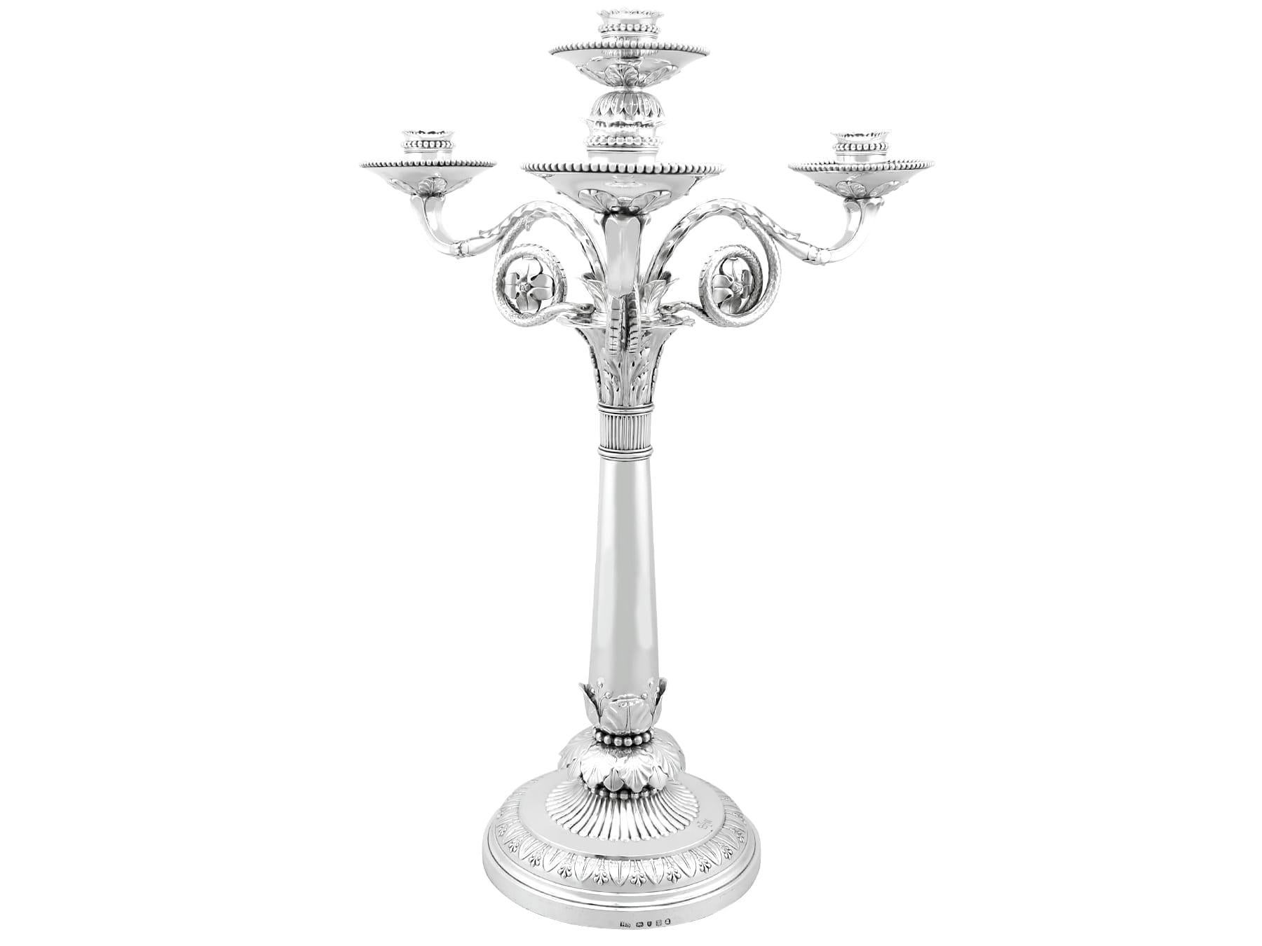 An exceptional, fine and impressive antique George III English sterling silver four light candelabrum centrepiece; an addition to our ornamental silverware collection

This exceptional antique George III English sterling silver candelabrum has a