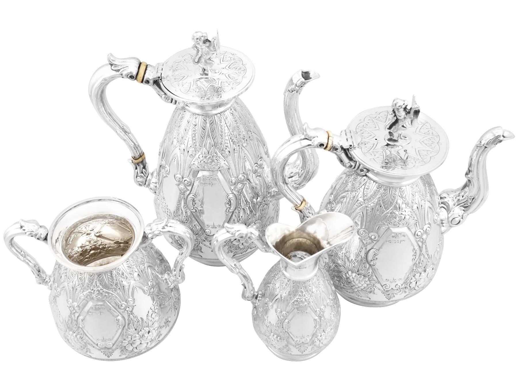 A magnificent, fine and impressive antique George V English sterling silver four piece tea and coffee set; part of our silver teaware collection.

This magnificent antique sterling silver tea and coffee set consists of a teapot, coffee pot, cream