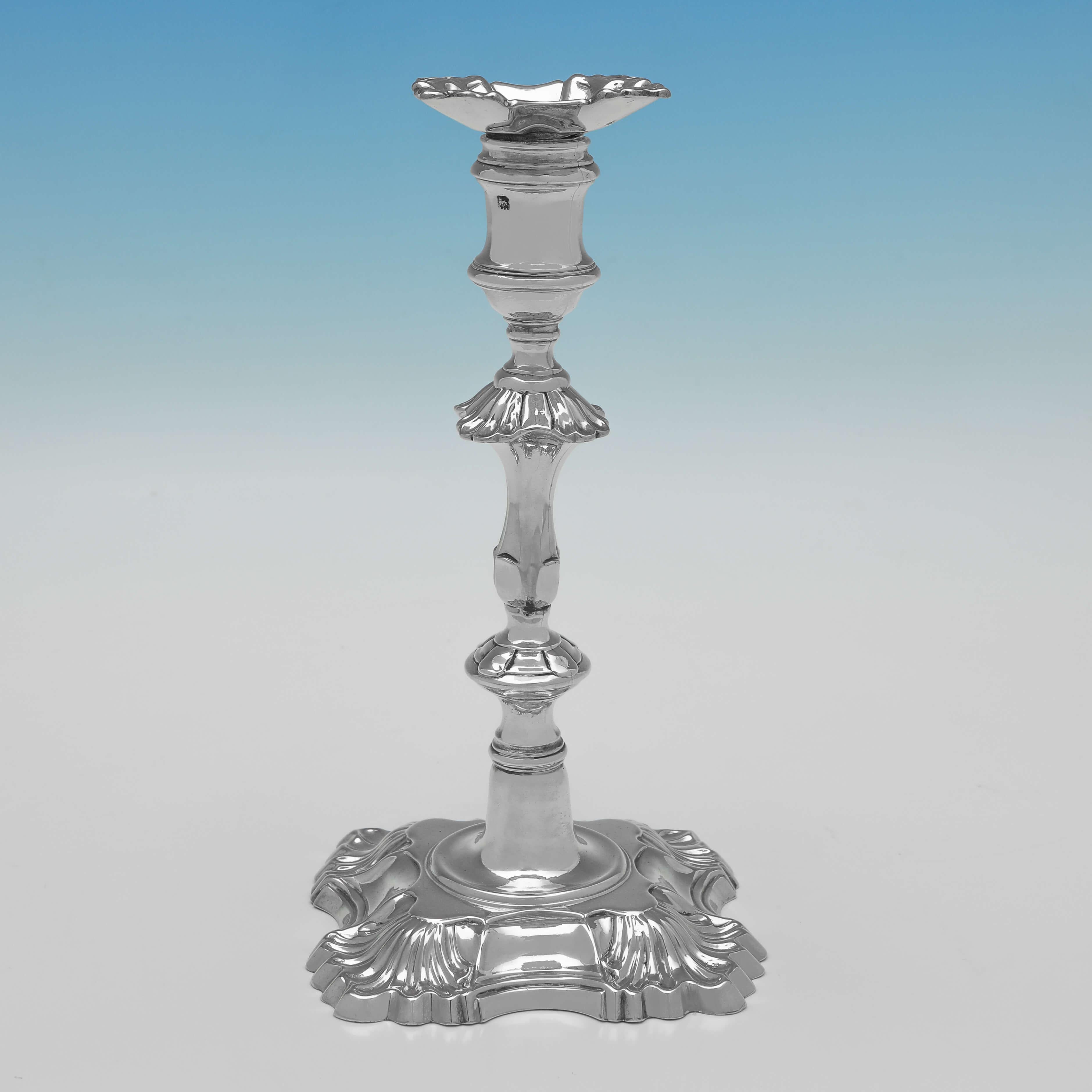 Hallmarked in London in 1753 by John Priest, this striking set of four George II, Antique Sterling Silver Candlesticks, are in the 'Four Shell' style, and feature removable nozzles. 

Each candlestick measures 8.5