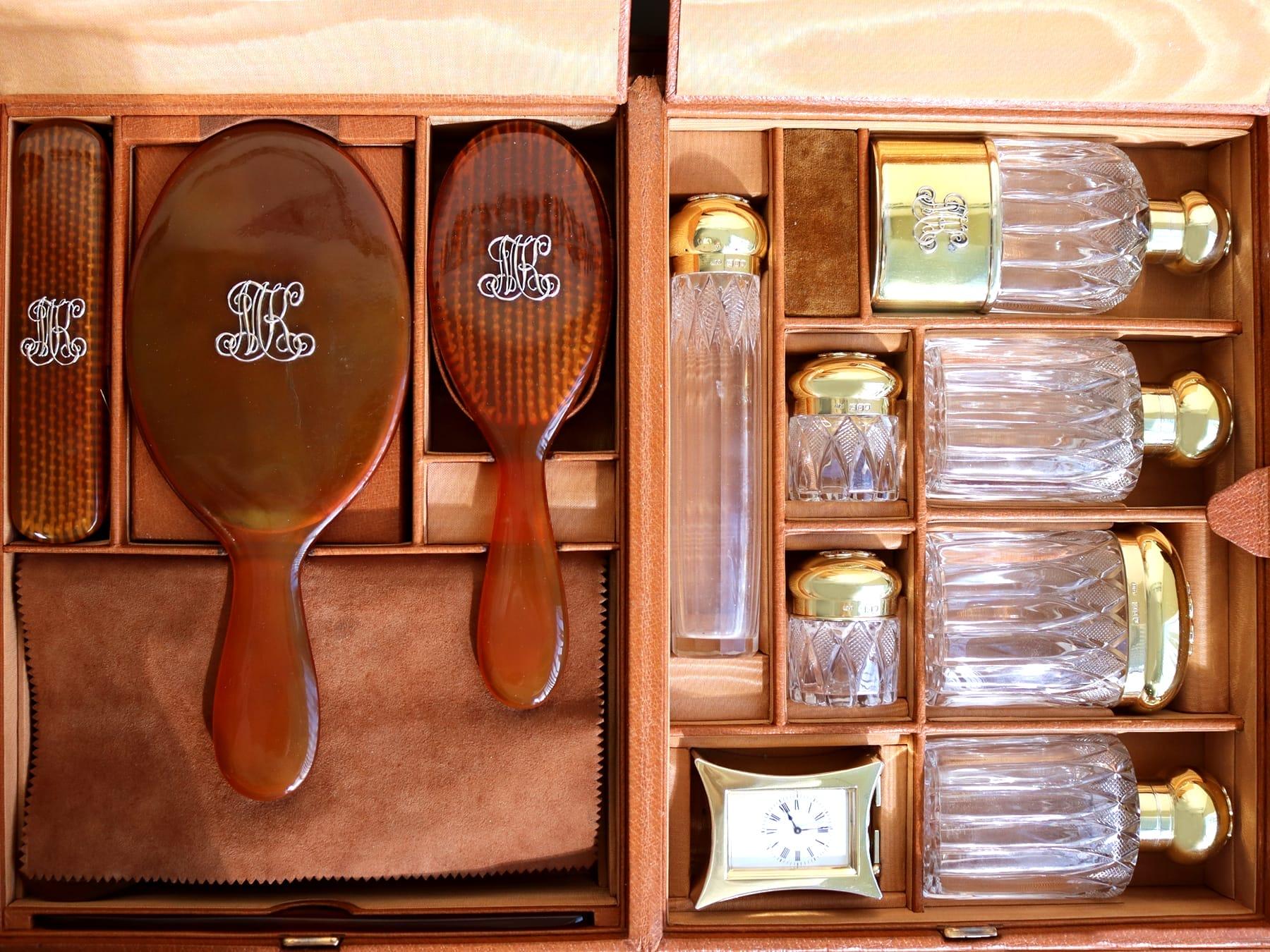 An exceptional, fine and impressive, rare antique Victorian English sterling silver gilt and celluloid fifteen piece travelling vanity set - boxed; part of our silverware collection.

This exceptional, fine and impressive, rare antique Victorian