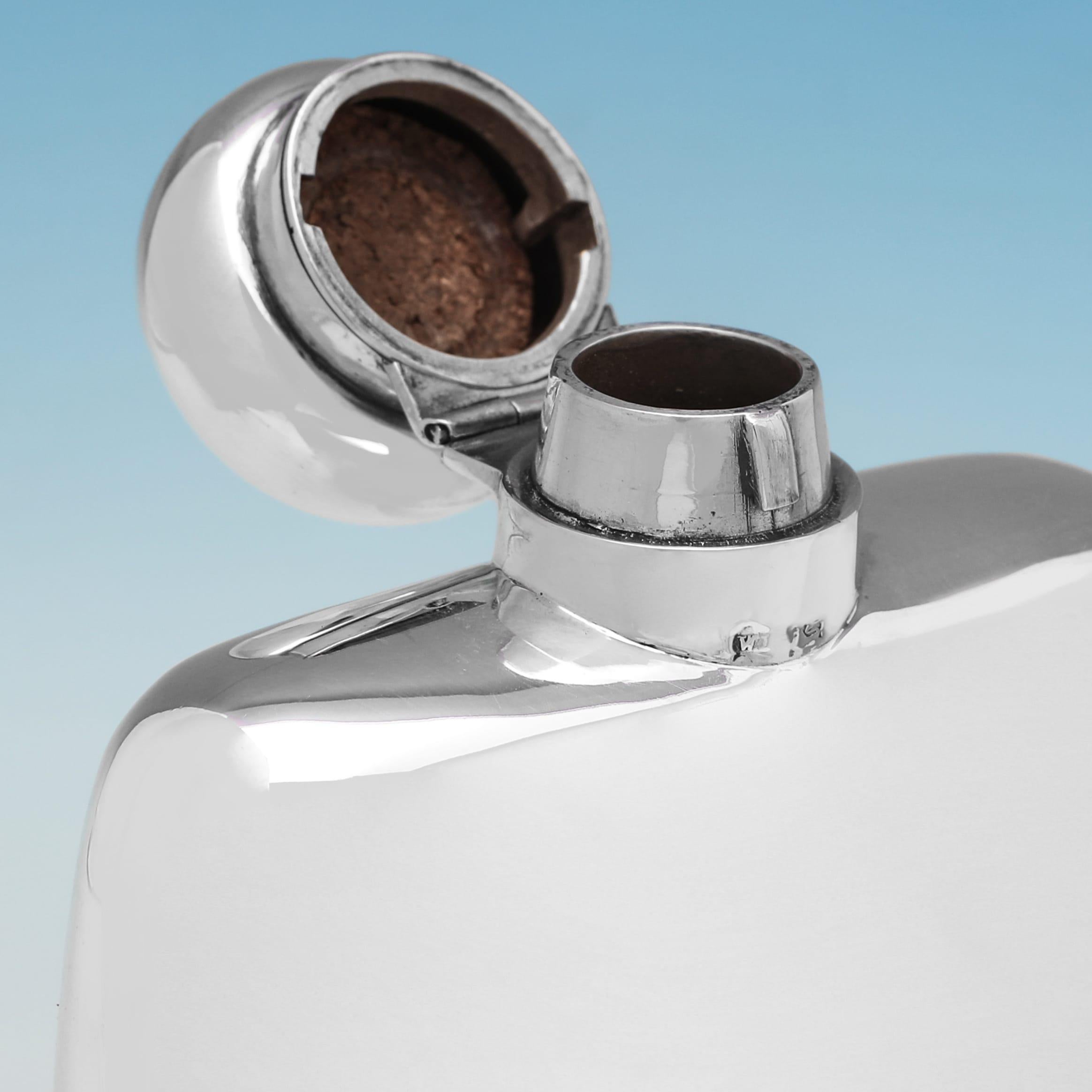 Sterling Silver Antique sterling silver hip flask with removable cup made in London in 1910 For Sale