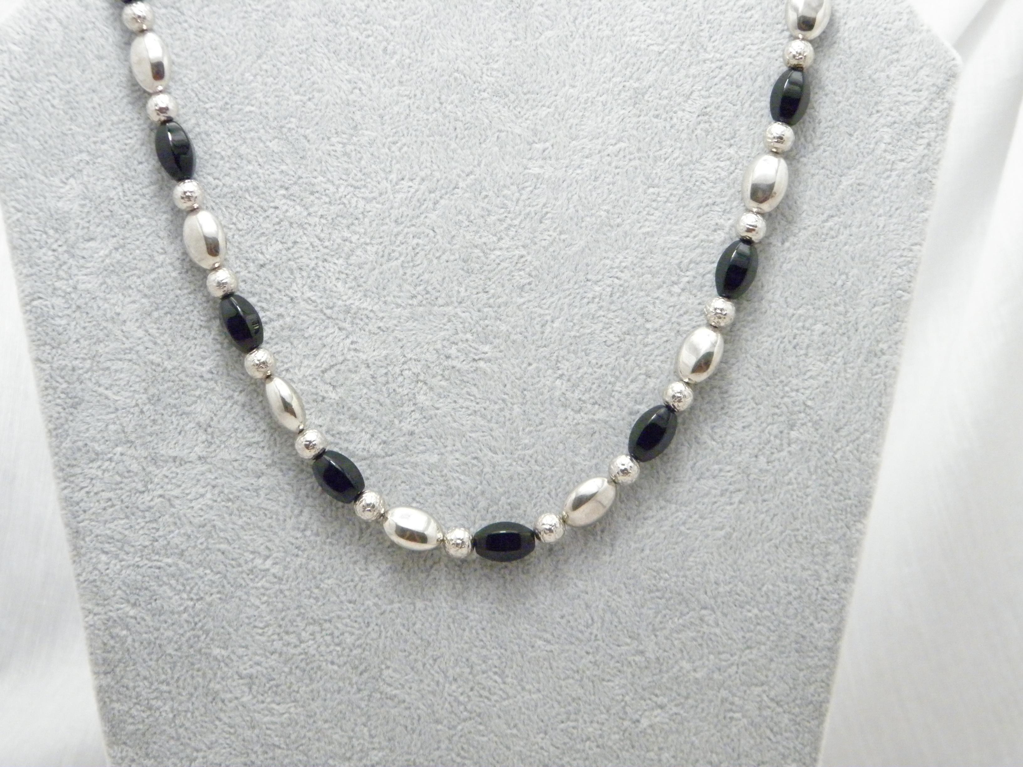 If you have landed on this page then you have an eye for beauty.

On offer is this gorgeous

STERLING SILVER BLACK JET MOURNING STYLE NECKLACE CHAIN

DETAILS
Material: Sterling Silver (chain and beads)
Gemstones: Factetted torpedo style black Jet