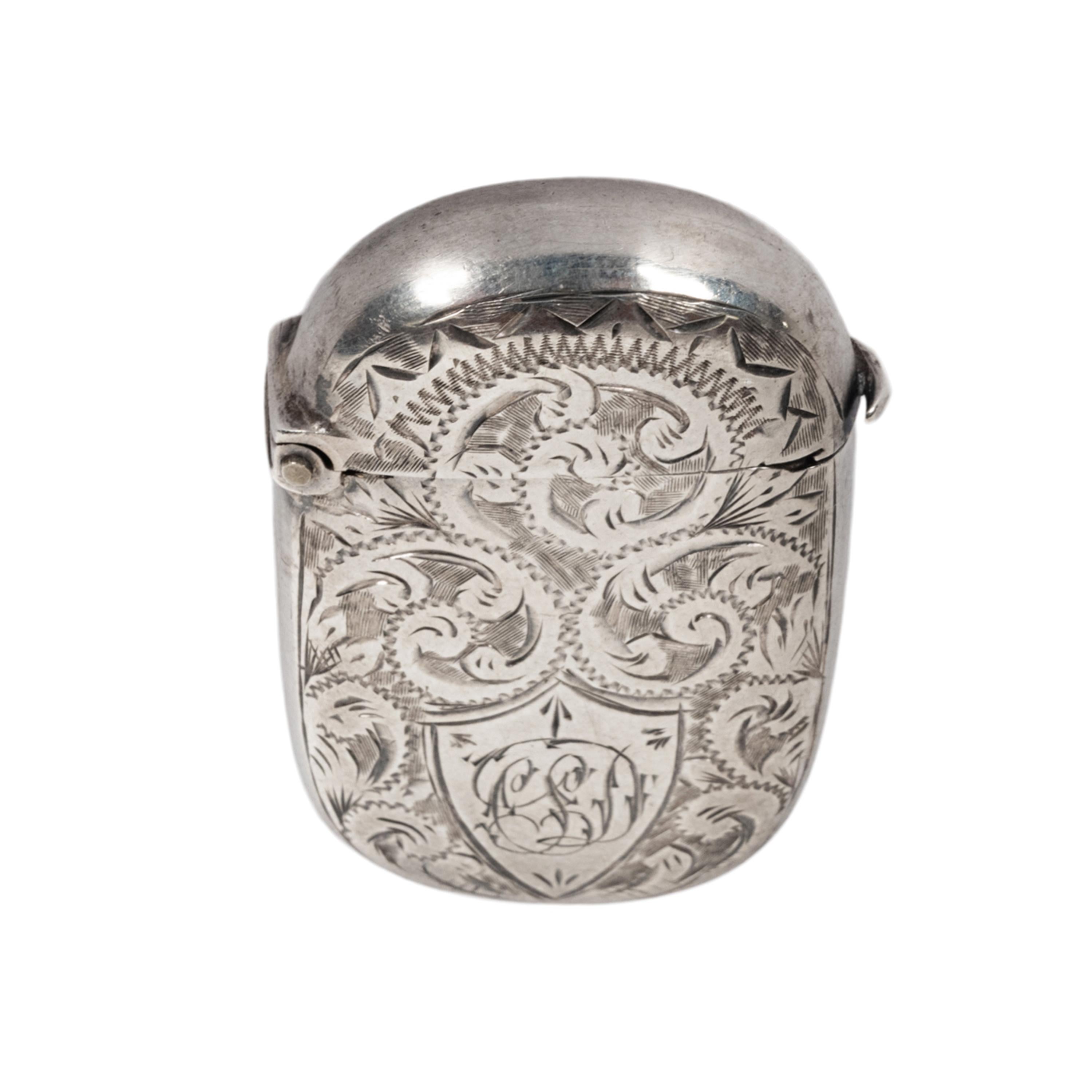 A good antique late Victorian engraved sterling silver vesta match case, George Goodman, Birmingham, 1886.
This miniature vesta case is profusely engraved on all sides with a floral design, the hinged lid opens and closes with ease and shuts