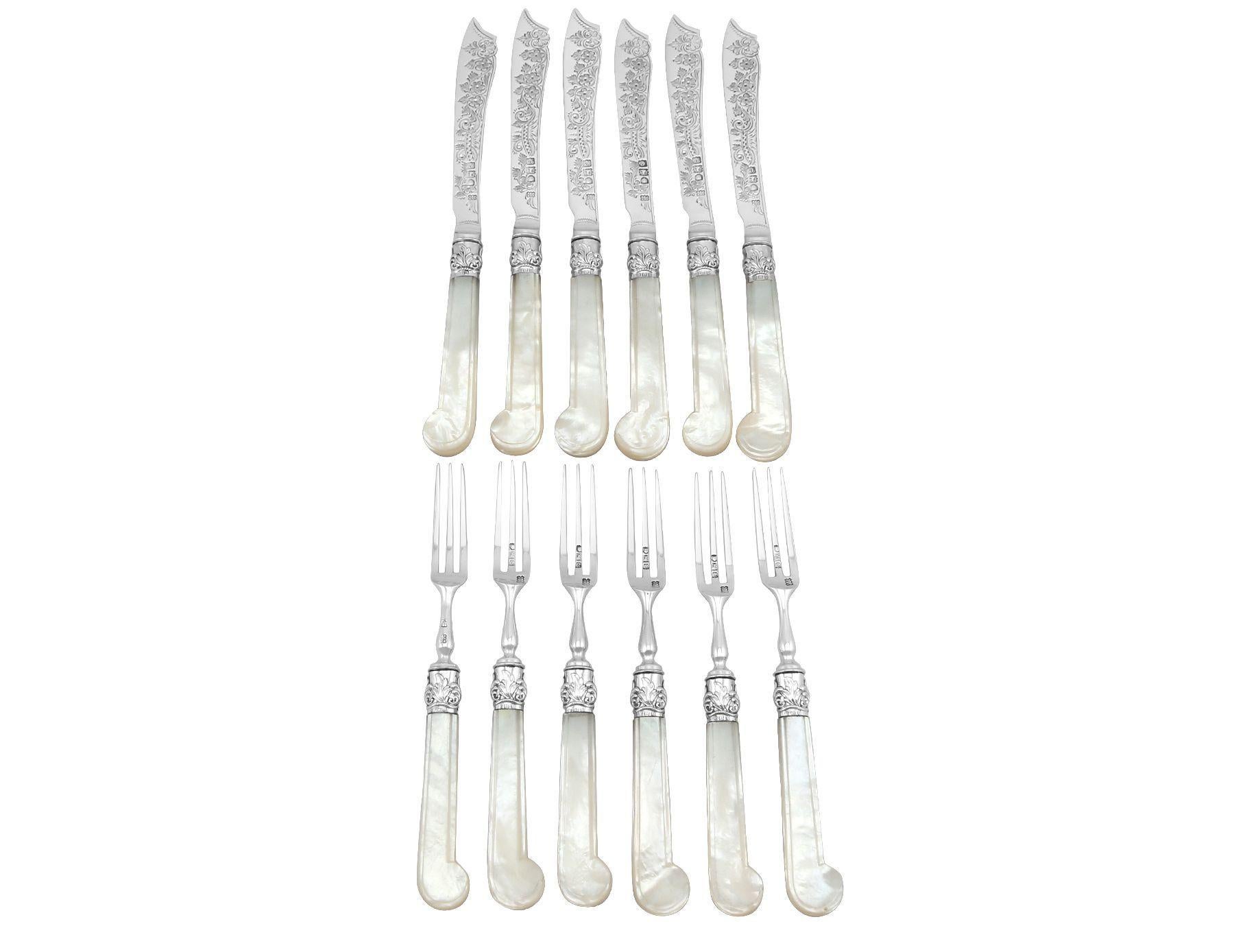 An exceptional, fine and impressive antique Victorian English sterling silver and mother of pearl handled fruit/dessert service for six persons - boxed; an addition to our silver flatware collection.

This exceptional antique Victorian sterling