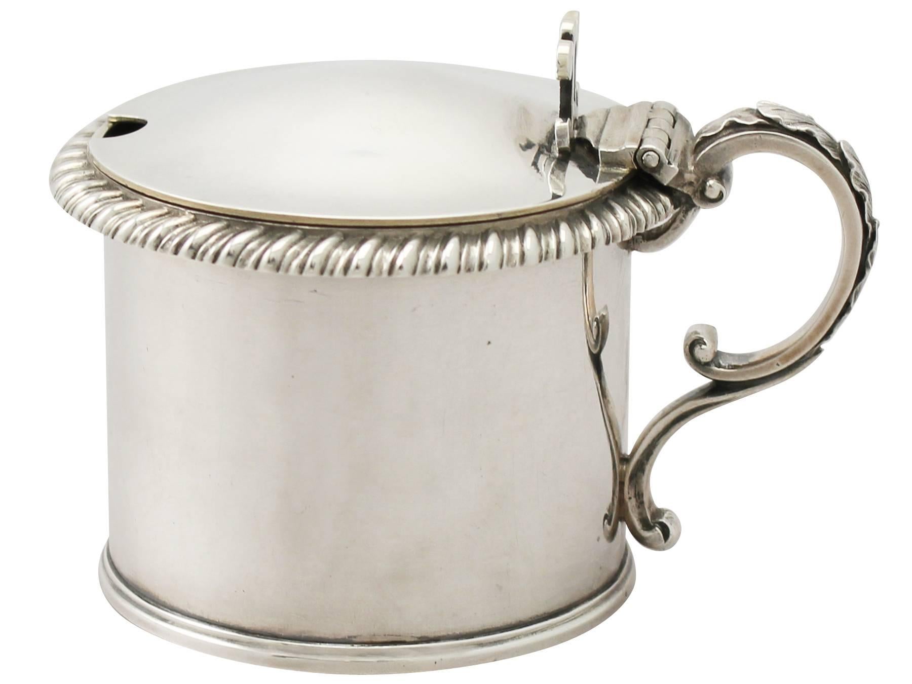 A very fine antique William IV English sterling silver drum mustard pot; an addition to our silver condiment collection.

This impressive antique William IV solid silver mustard pot has a plain drum shaped form.

The sterling silver body of the