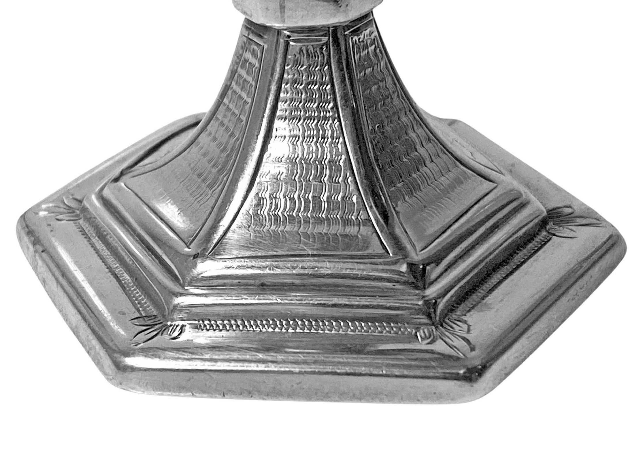 Antique English 19th century sterling silver Pagoda style Pepper Castor Birmingham 1859 Aston & Son. Hexagonal shape, the panels engraved textured design, one panel with vacant wreath ribbon cartouche, detachable cover with pierced foliate design.