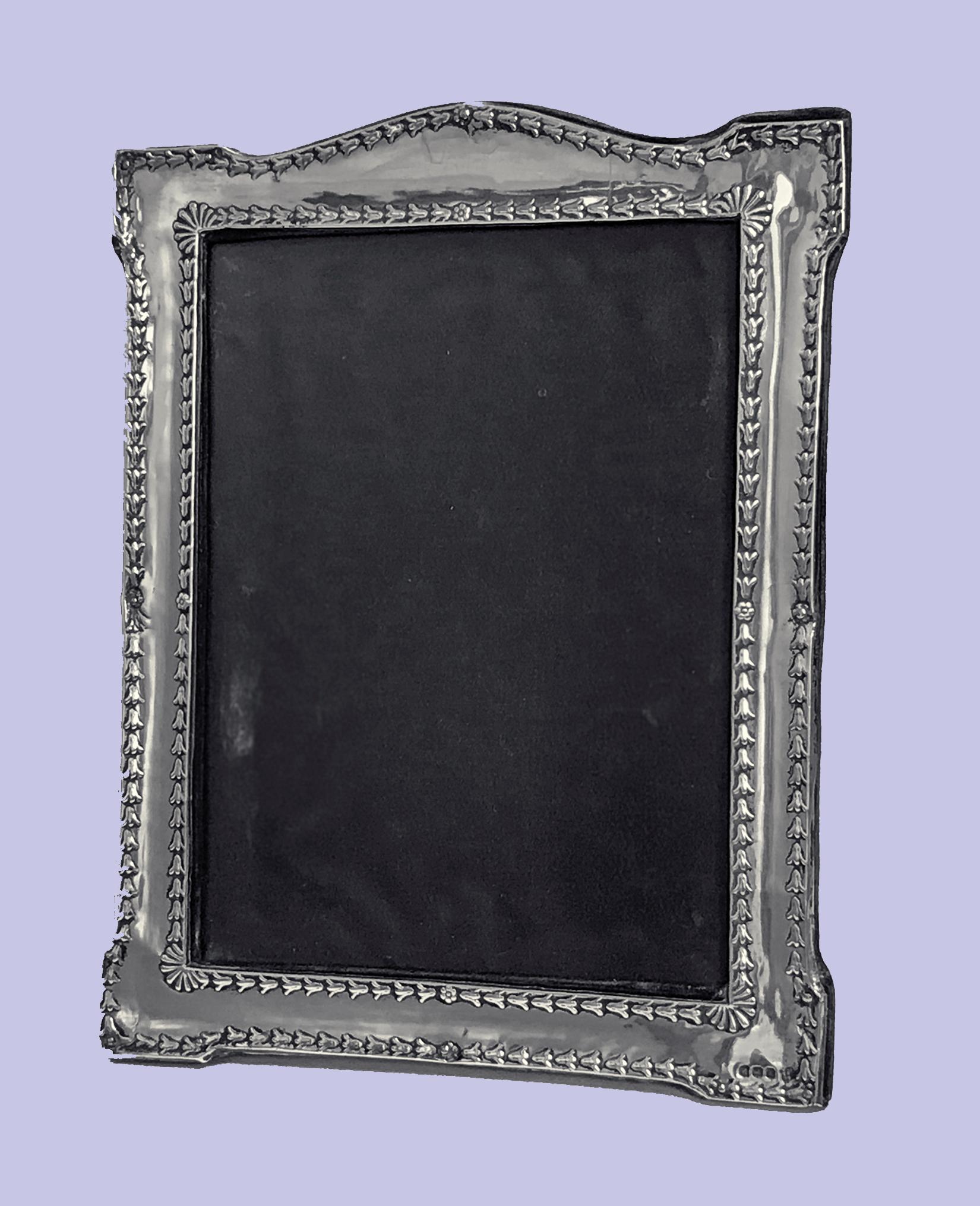 Antique Sterling Silver Photograph Frame, Birmingham 1917, Boots Pure Drug Company. Rectangular shape with with borders of bell drop and shell cornices, otherwise plain, dark velvet back and easel. Minor wear commensurate with age. No splits to