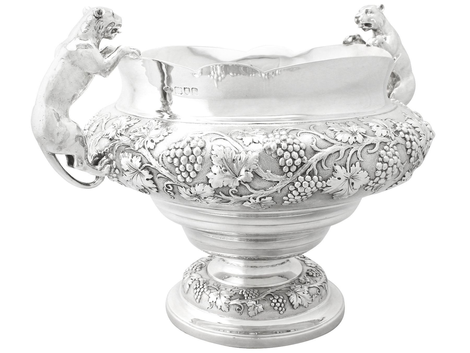 A magnificent, fine and impressive, large antique George V English sterling silver presentation bowl, an addition to our ornamental silverware collection.

This magnificent antique George V sterling silver, large silver decorative bowl has a plain