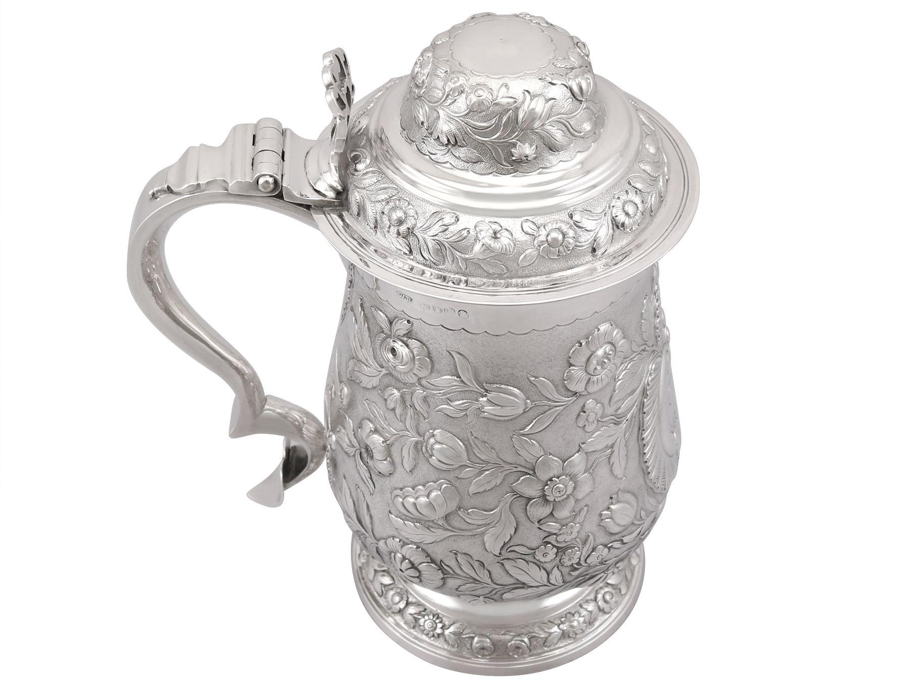 An exceptional, fine and impressive, large antique George IV English sterling silver quart and a half tankard made by William Bateman I; an addition to our silver tankard collection.

This exceptional antique George IV sterling silver tankard has