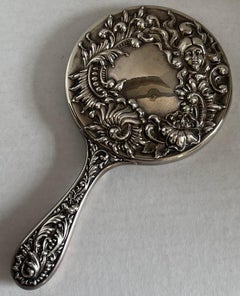 Antique Sterling Silver Repoussè Hand Mirror