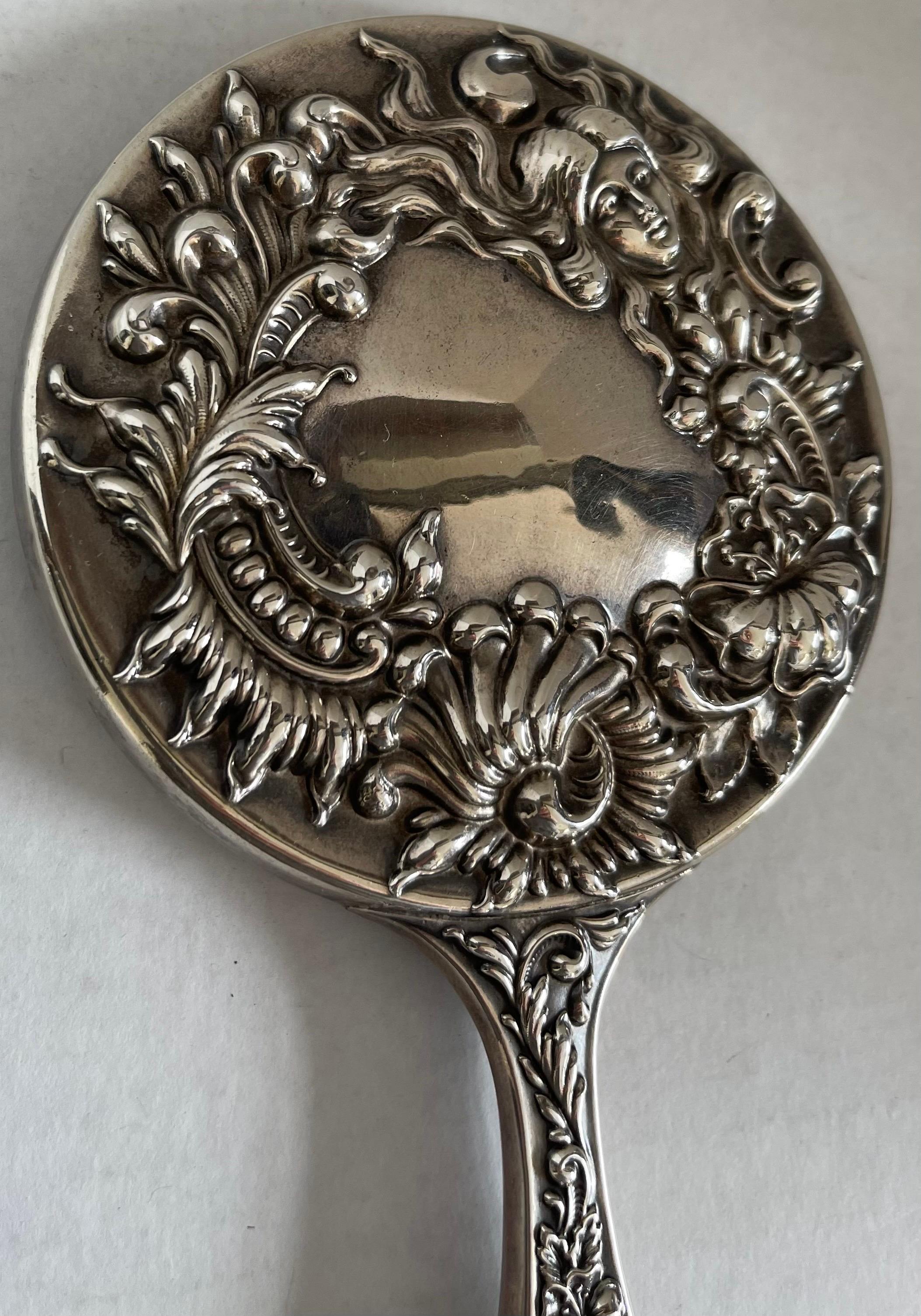 Early 20th Century Antique Sterling Silver Repoussè Hand Mirror For Sale