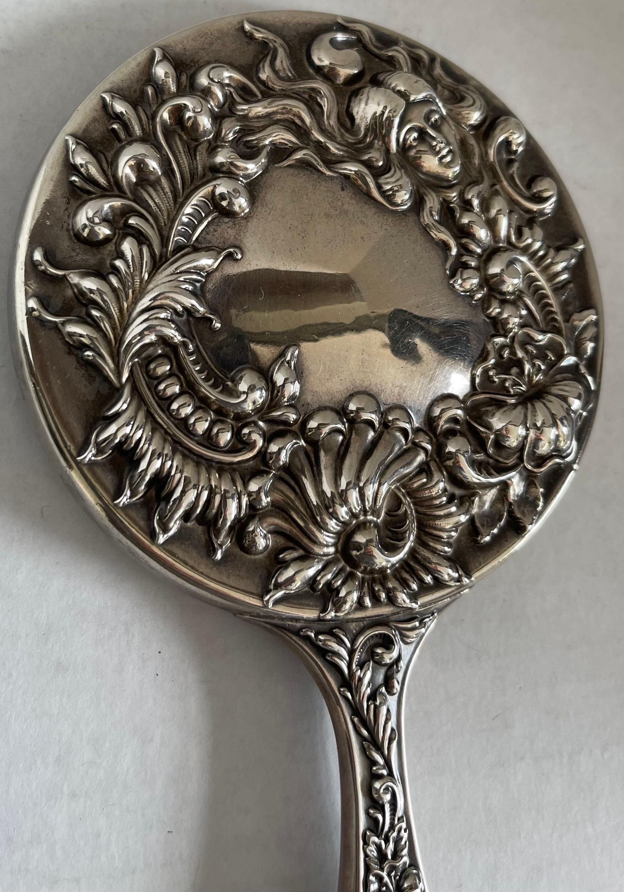 Antique Sterling Silver Repoussè Hand Mirror In Good Condition For Sale In Stamford, CT