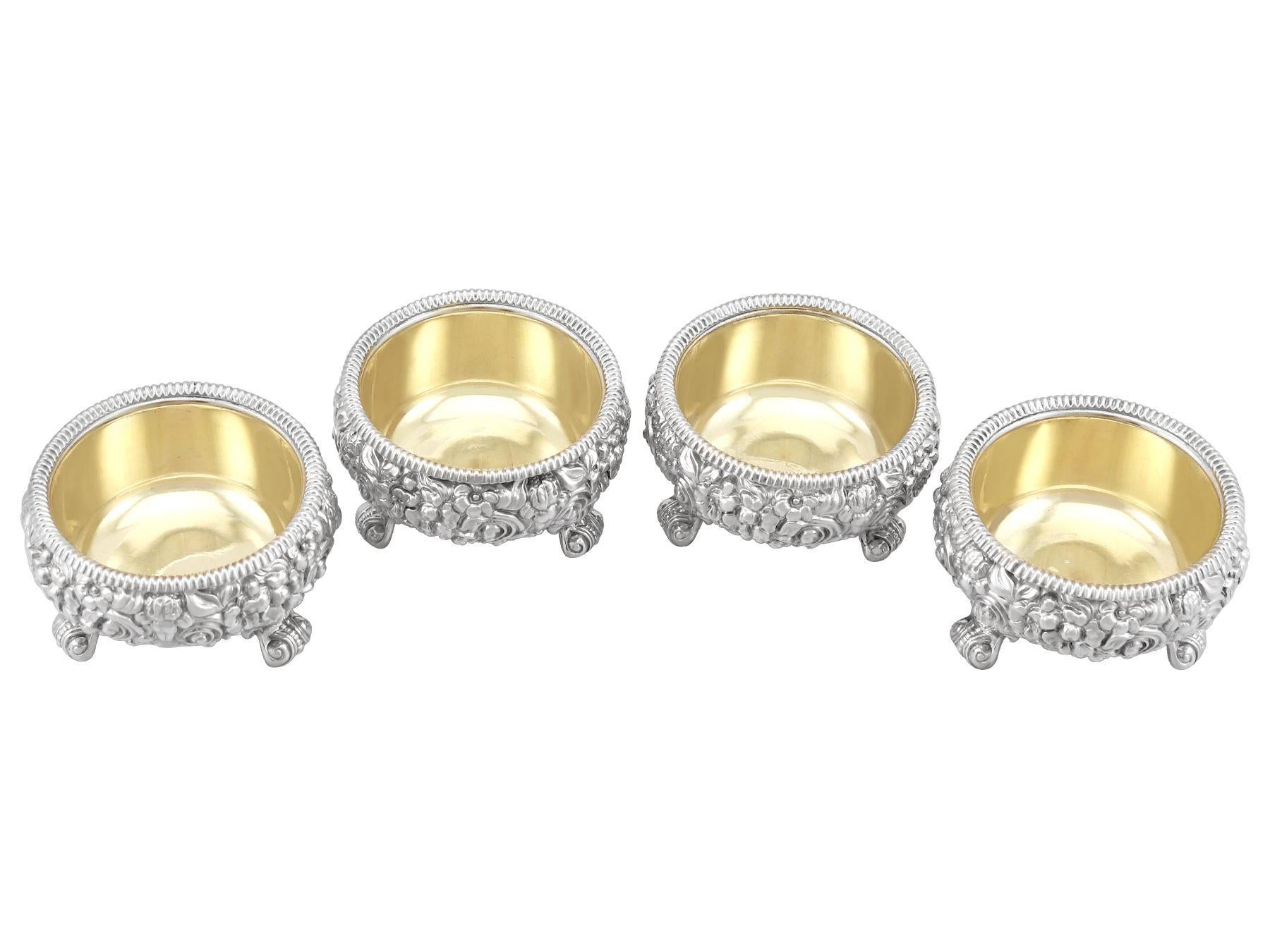 An exceptional, fine and impressive set of four antique Georgian English sterling silver salts; an addition to our silver cruet and condiment collection

These exceptional antique George III sterling silver salts have a circular cauldron shaped