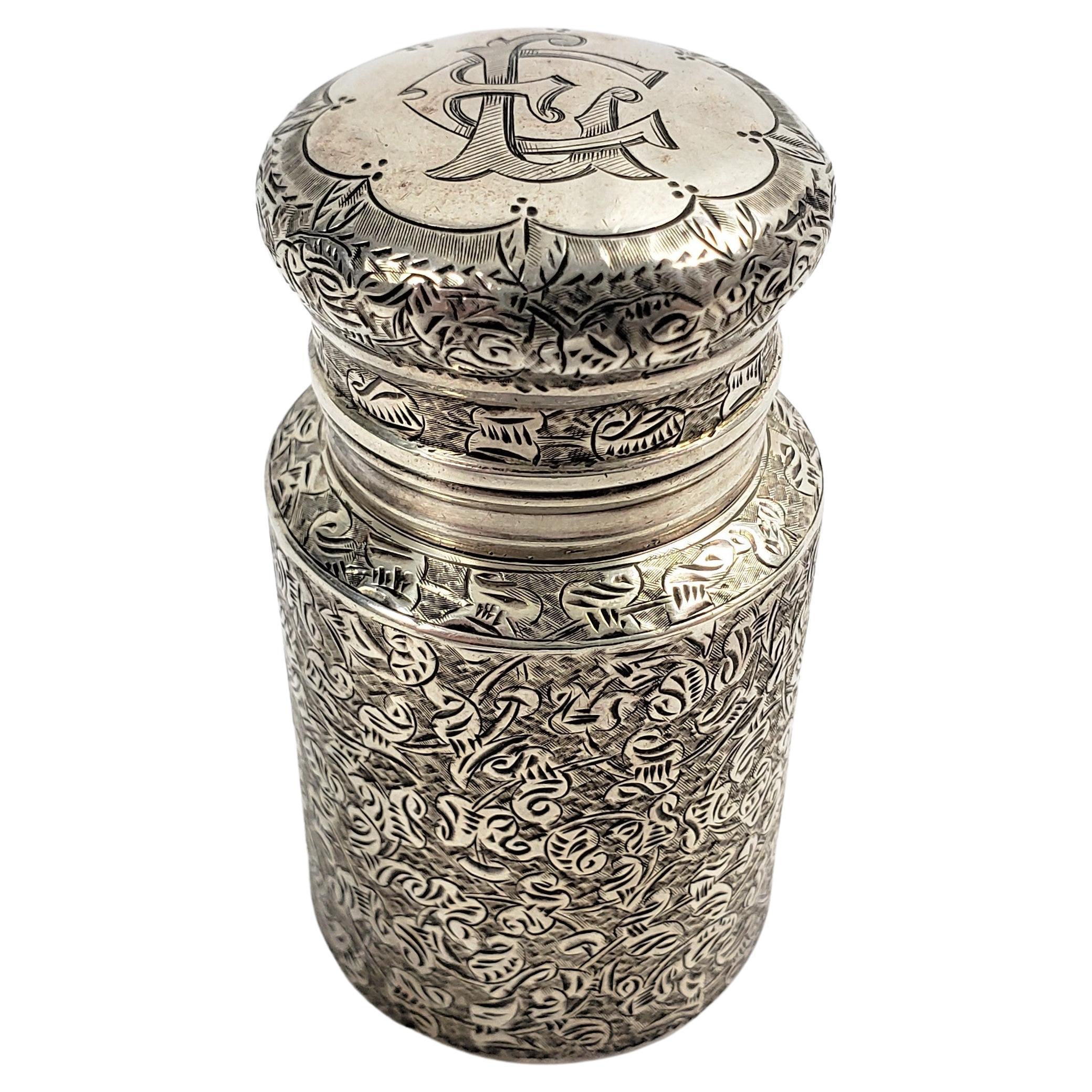 Flacon de parfum ou de parfum ancien en argent sterling avec décoration ciselée