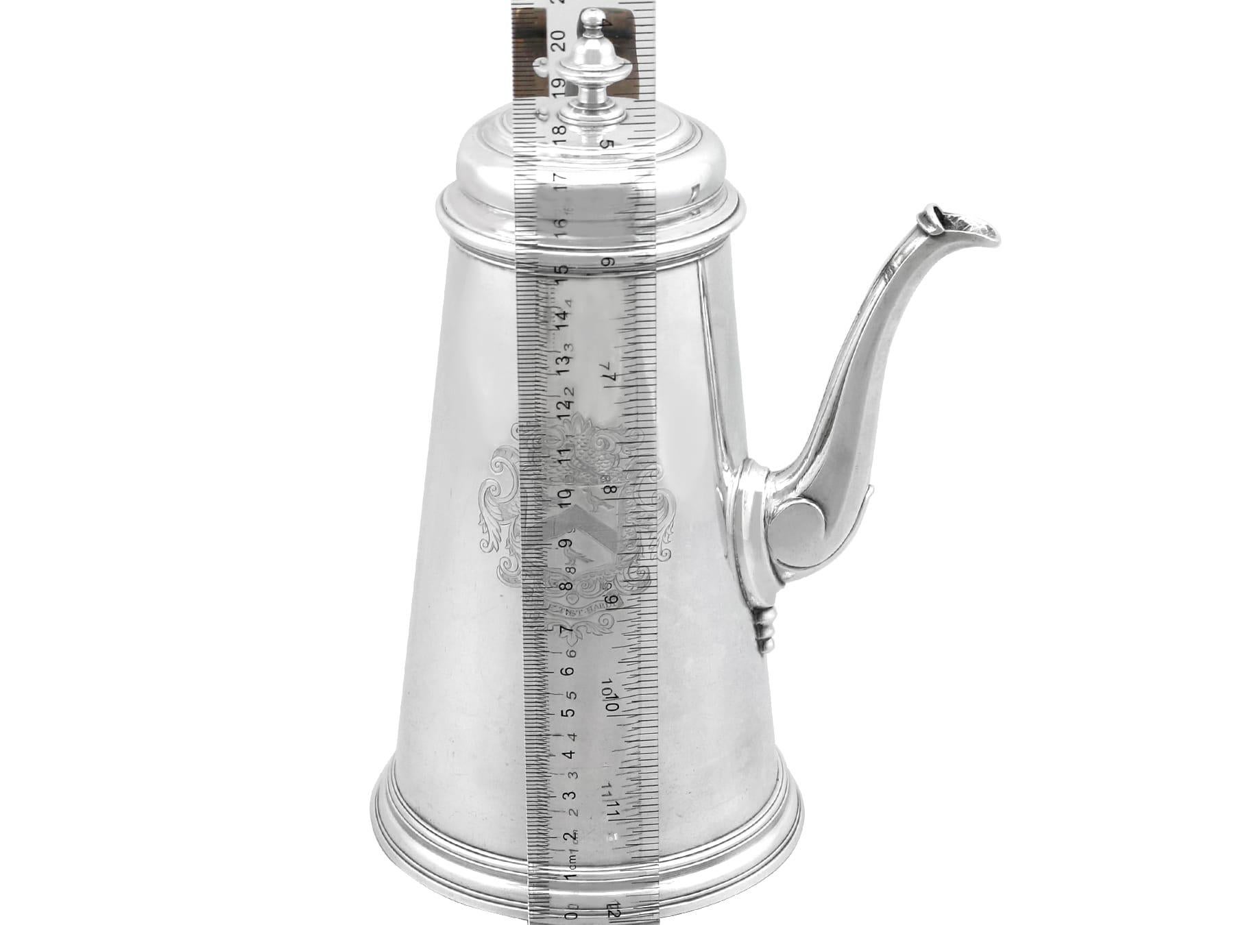 An exceptional, fine and impressive antique Georgian sterling silver side-handled chocolate pot; an addition to our continental teaware collection

This exceptional antique George II English sterling silver hot chocolate pot has a plain tapering