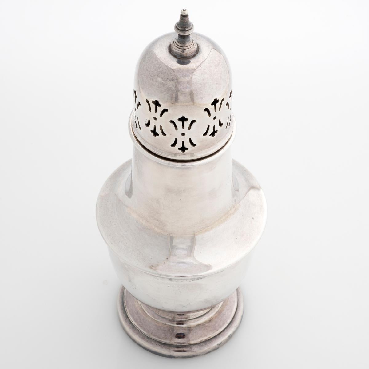 This antique sterling silver sugar holder, is Hallmarked Viners Ltd, Sheffield, UK, 1935,  Measuring 70mm 170mm.  