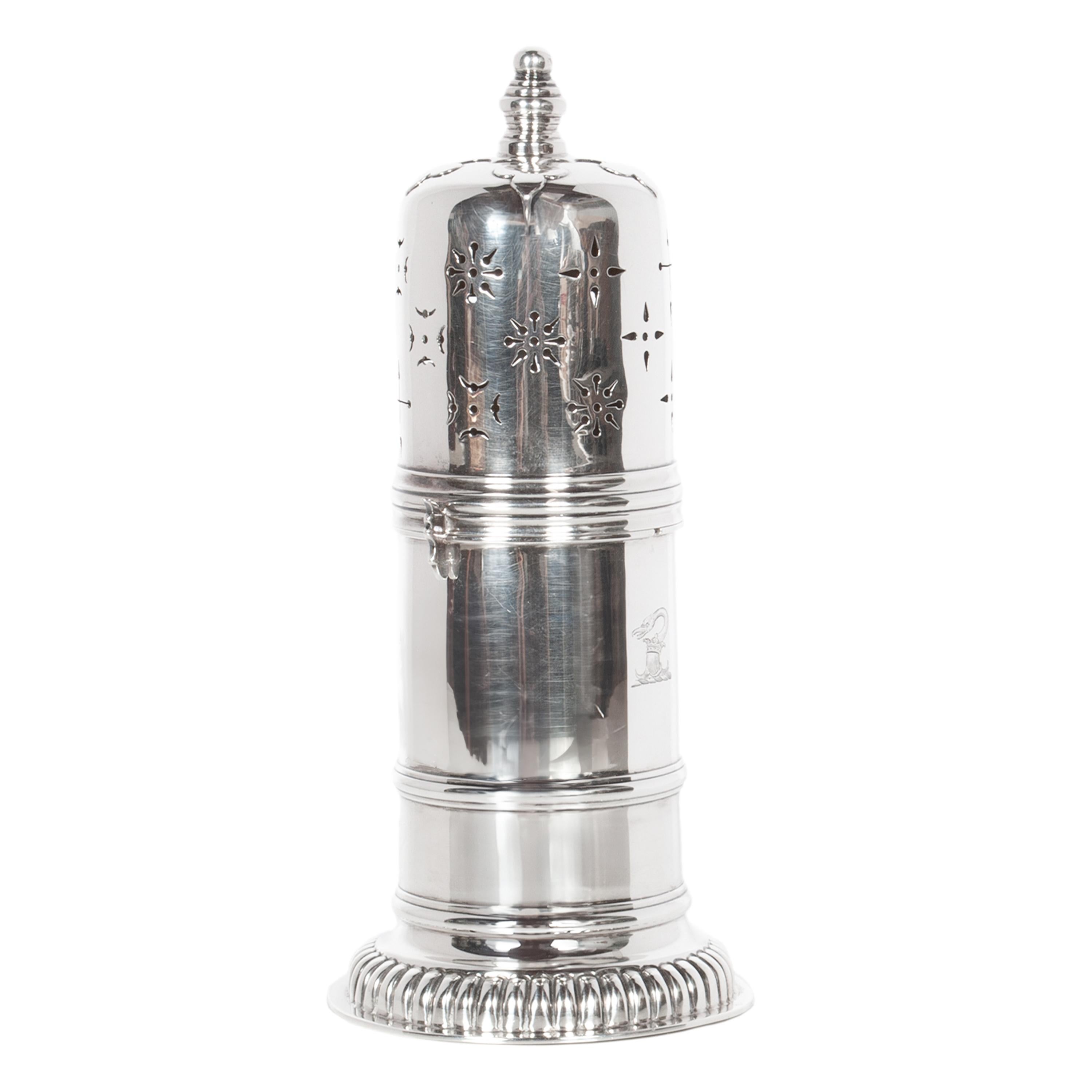 A large & fine antique sterling silver sugar, shaker or muffineer, by Elkington & Co, London, 1912.
This very elegant antique cylindrical silver sugar sifter is by one of England's most respected makers of silver; Elkington & Co. The sifter is in